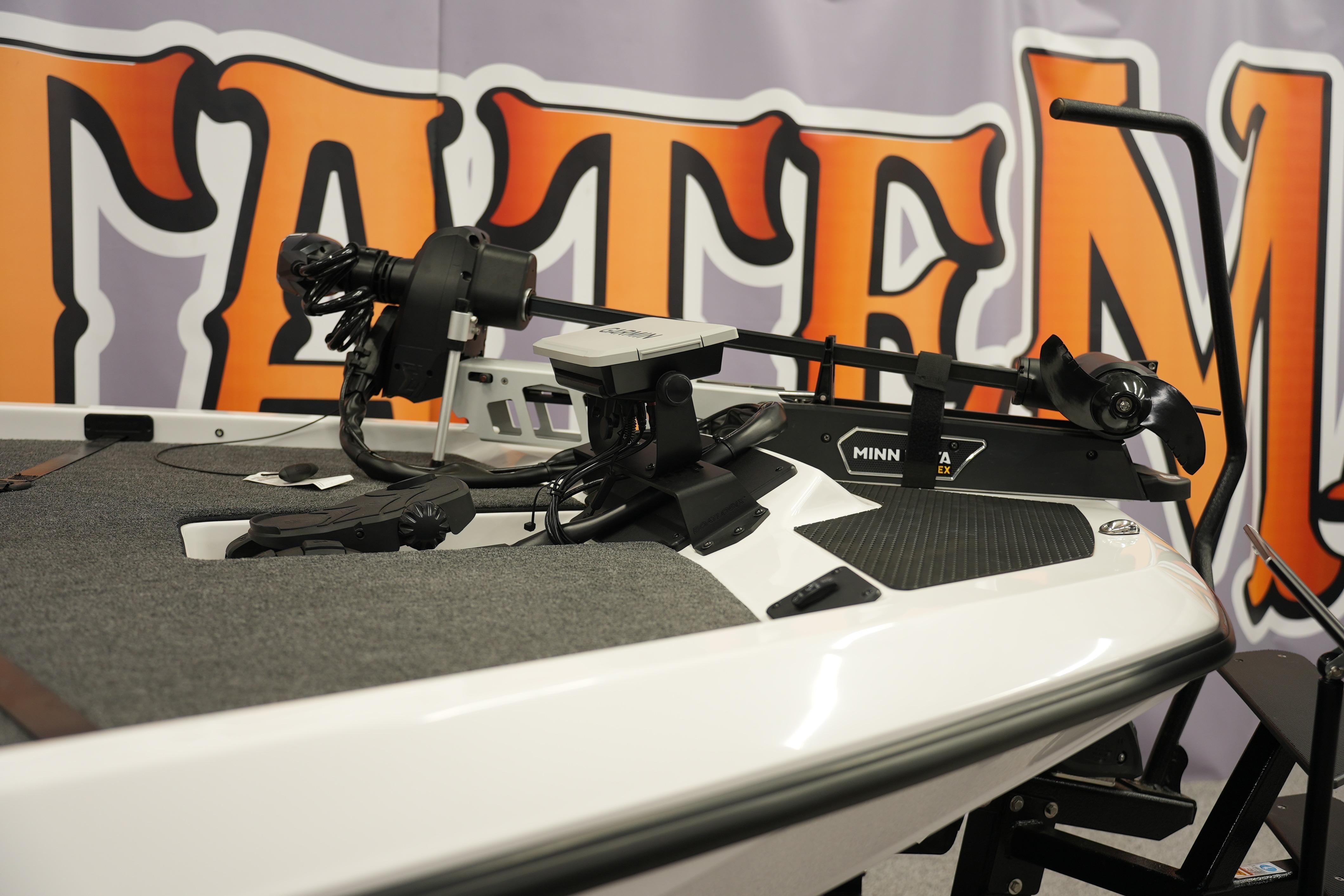 2026 iKon VLE21 boat with Minn Kota trolling motor, showcased indoors.