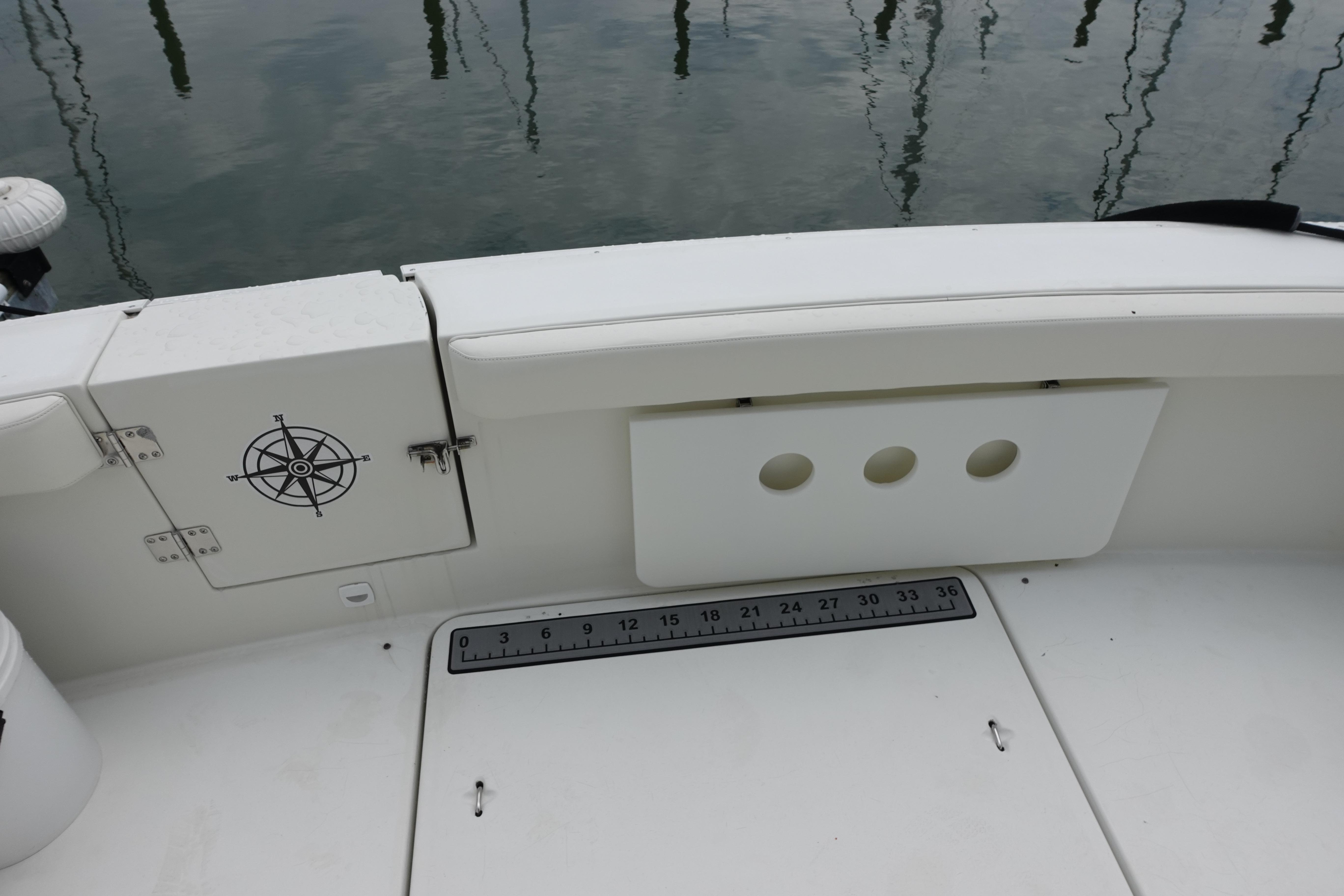 1993 Silverton 31 Convertible boat deck with compass design and measurement scale.