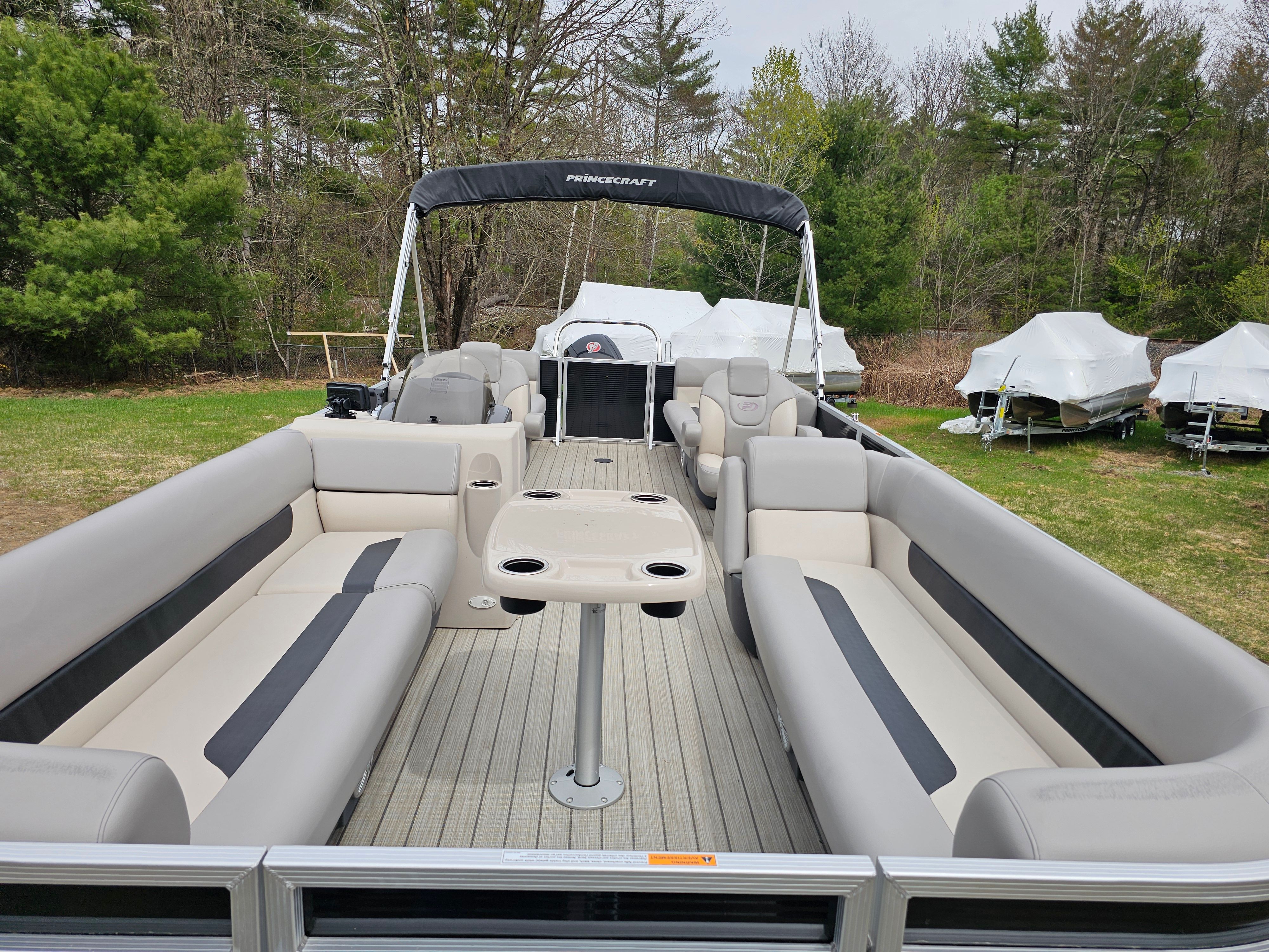 2021 Princecraft Vectra 23XT pontoon boat with outdoor seating.