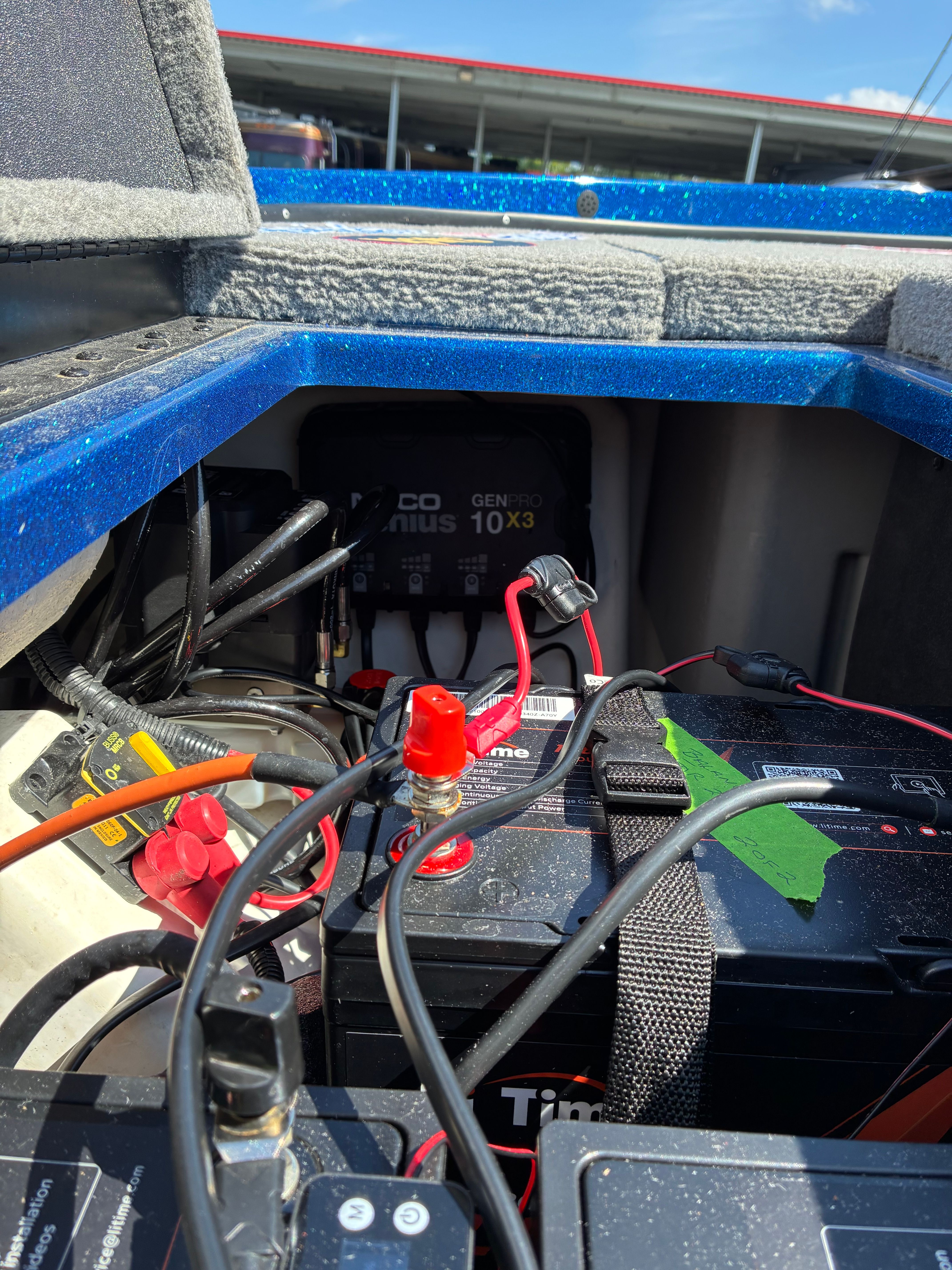 Interior view of a 2024 Nitro Z18 Pro with batteries and wiring.