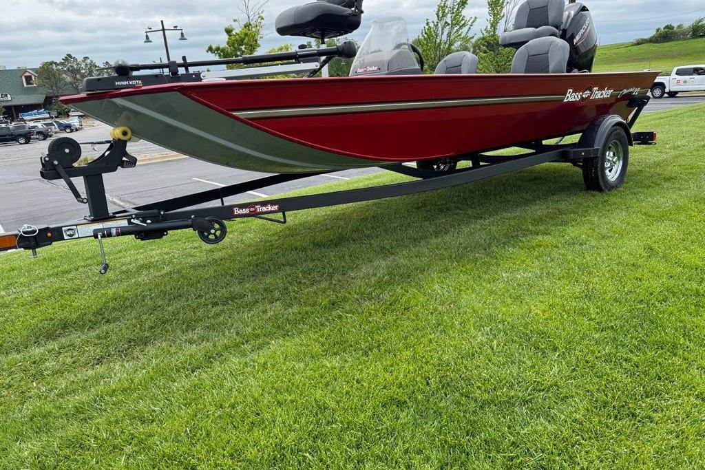 2026 Tracker Bass Tracker Classic XL boat on trailer, parked on grass.