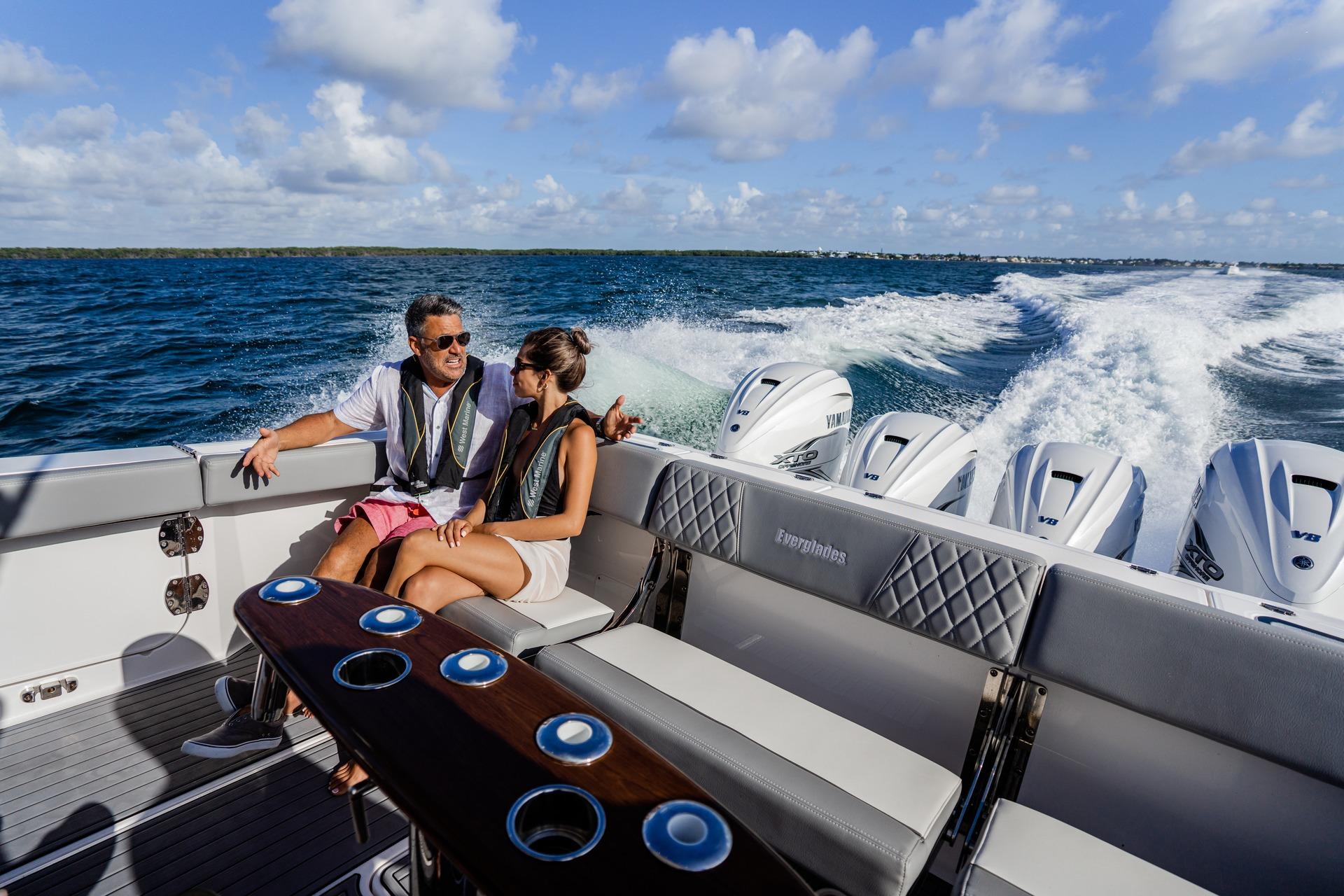 Couple enjoying a ride on the 2026 Everglades 455 Center Console boat.