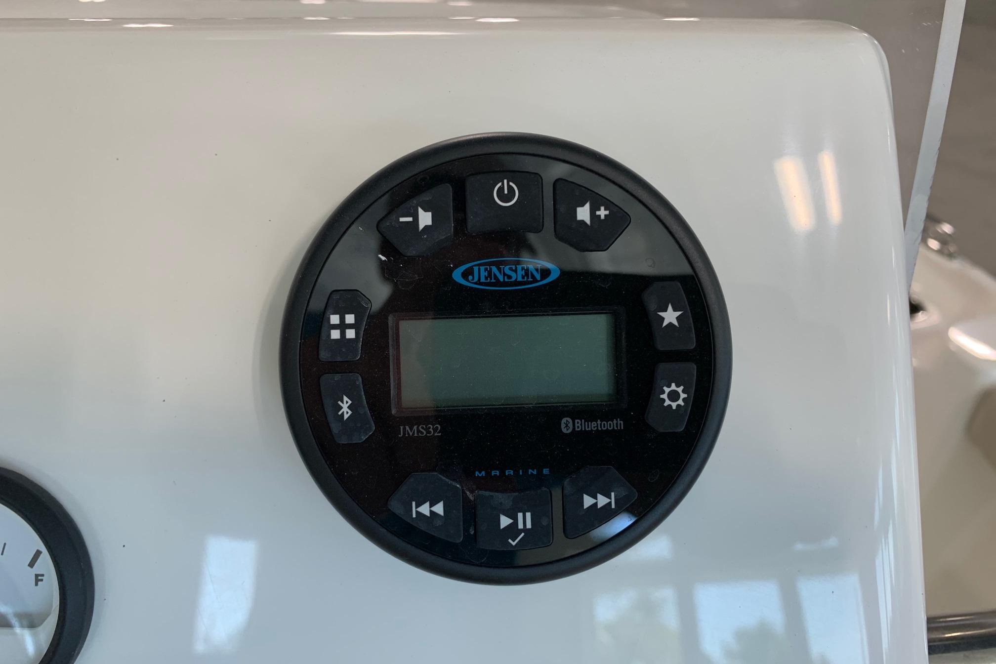 Jensen marine audio system on 2026 Key West 188 Bay Reef boat dashboard.