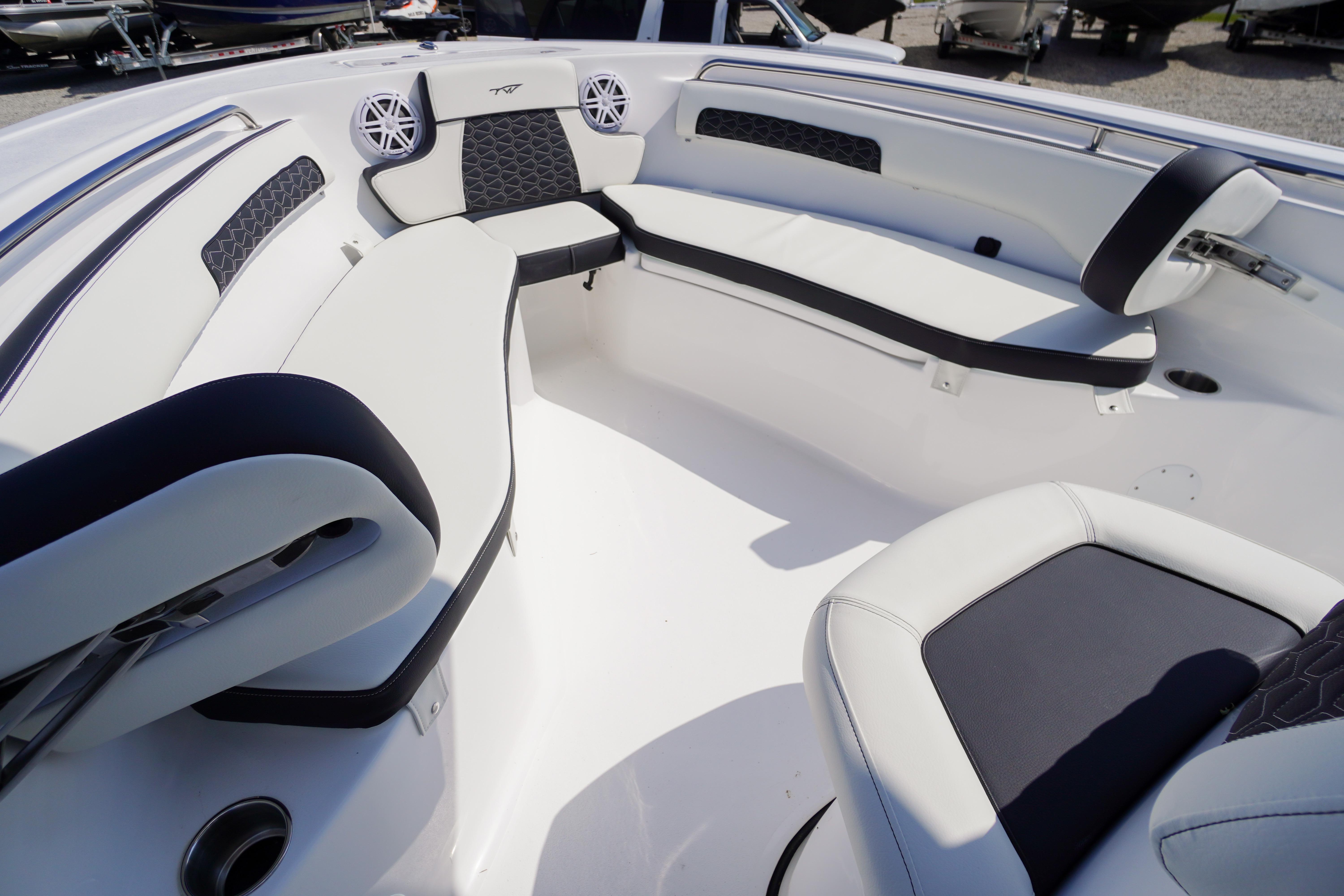 2026 Tidewater 220 CC Adventure boat interior with cushioned seating and modern design.