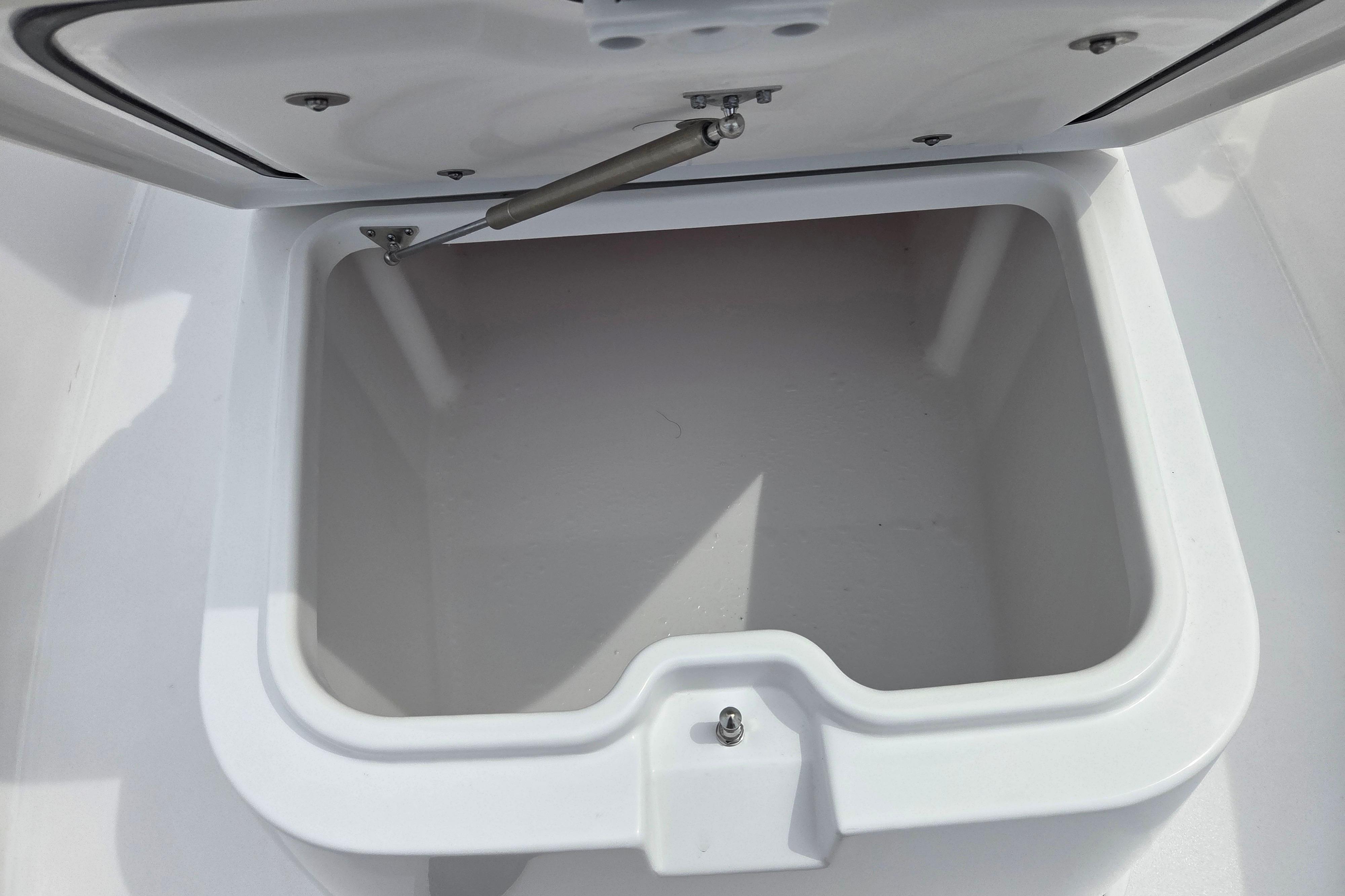 Open storage compartment on 2026 Sportsman Masters 247OE Bay Boat.