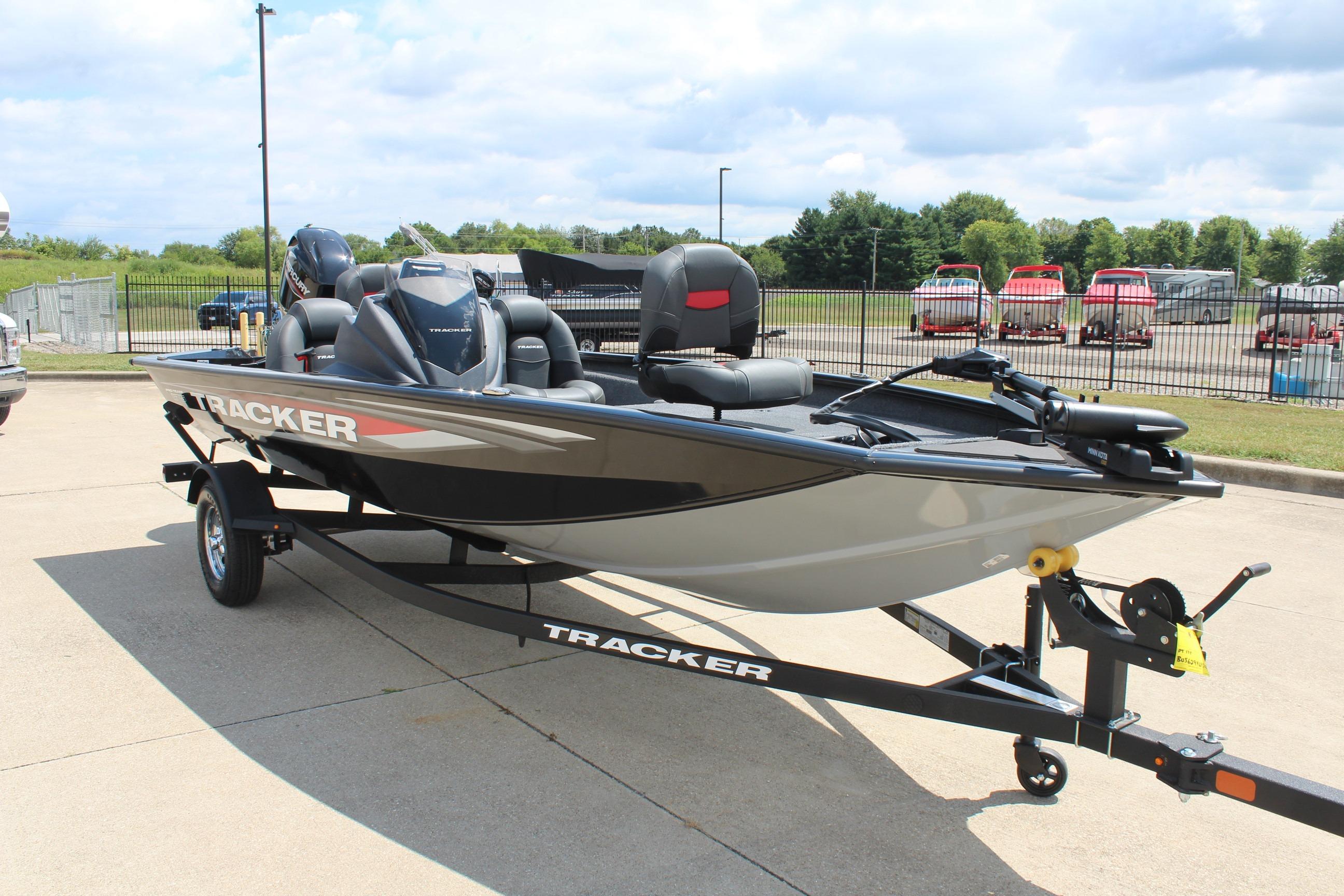 2026 Tracker Pro Team 175 boat on trailer, parked outdoors.