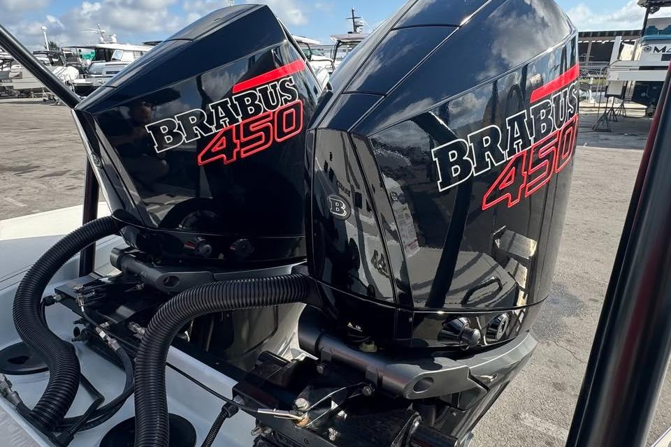 Twin BRABUS 450 engines on a 2023 Shadow 900 ST boat, dockside view.