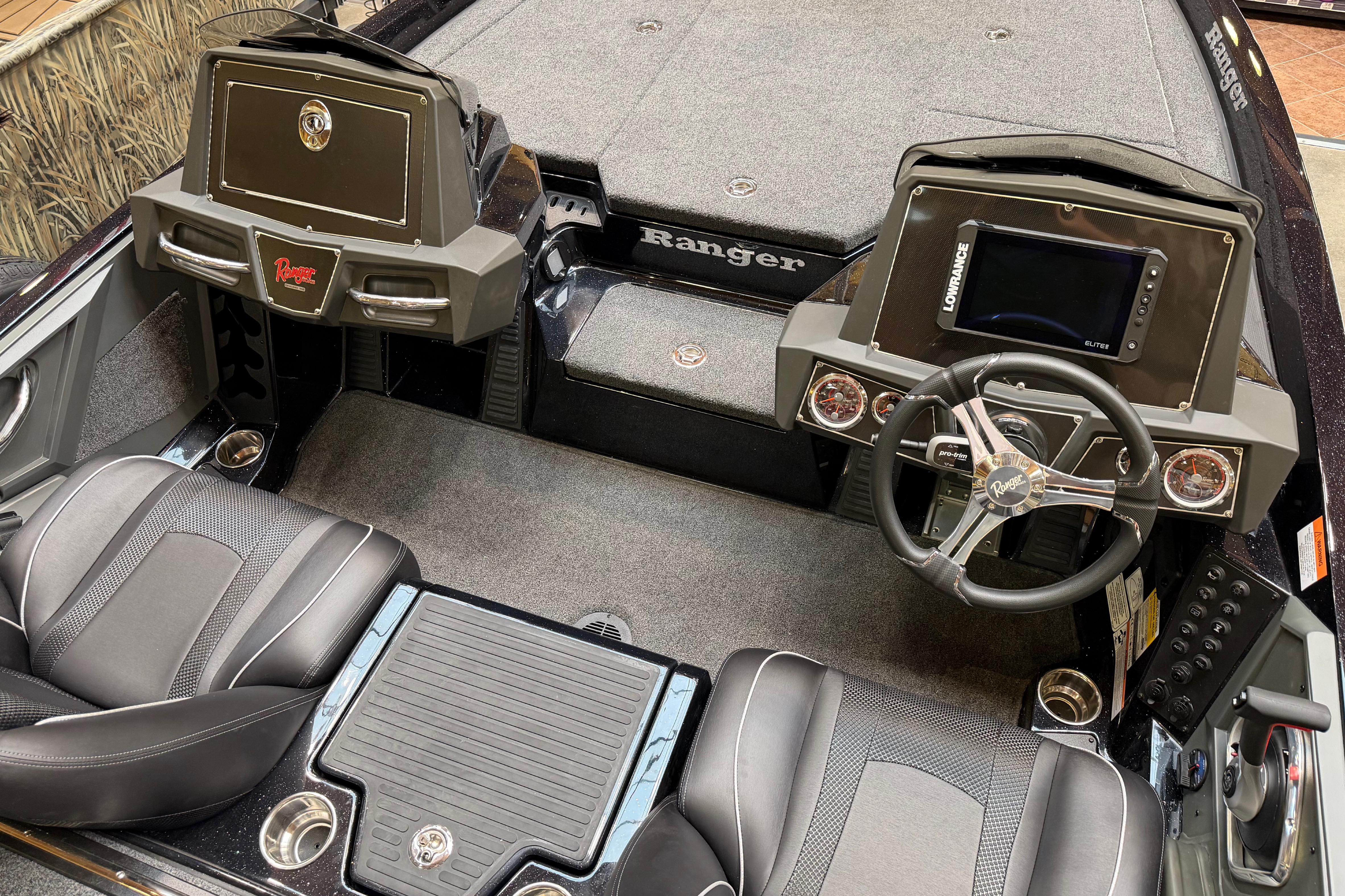 2026 Ranger Z518 boat interior with dual consoles, steering wheel, and electronic display.
