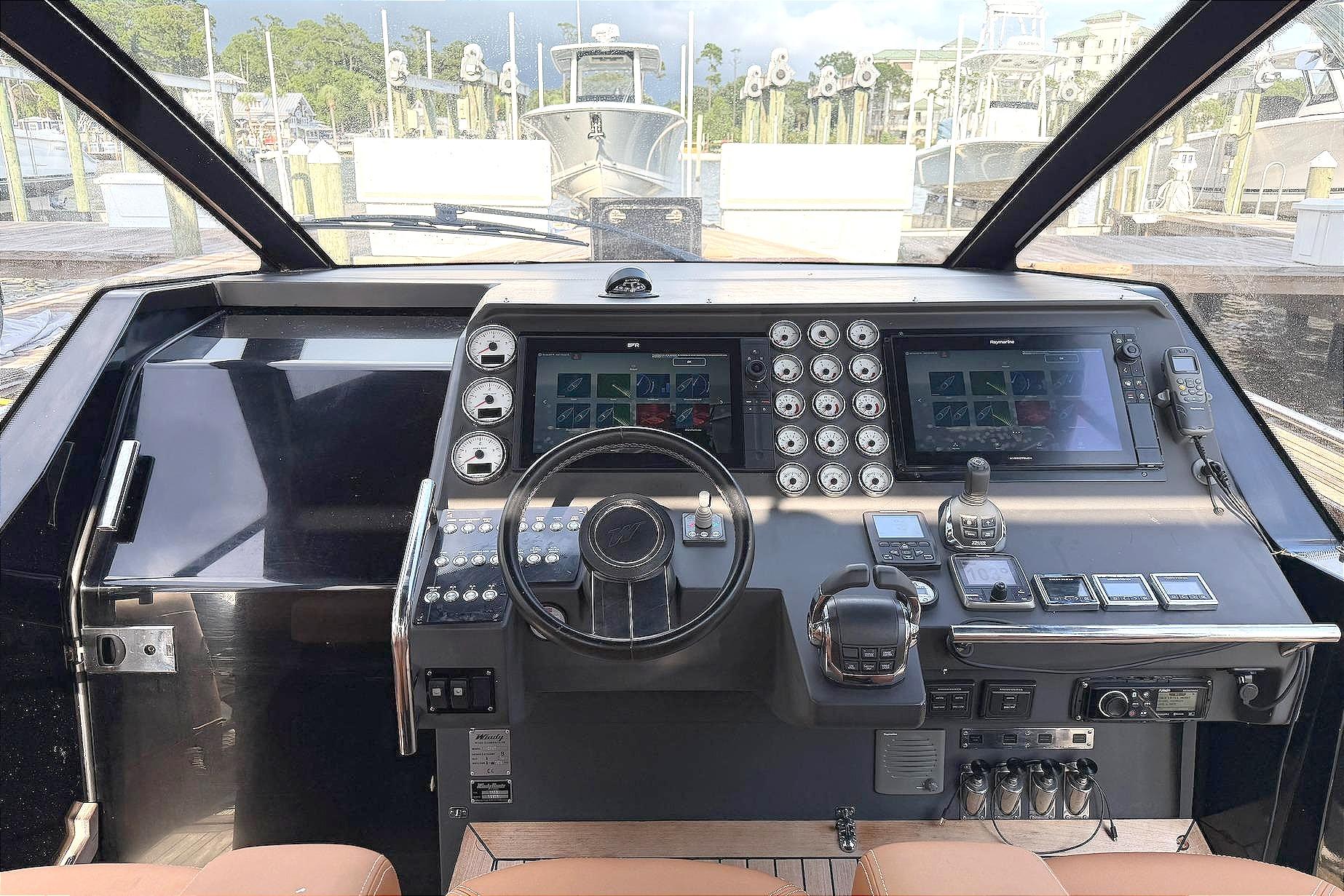 Control panel of a 2013 Windy SR52 yacht with advanced navigation systems.