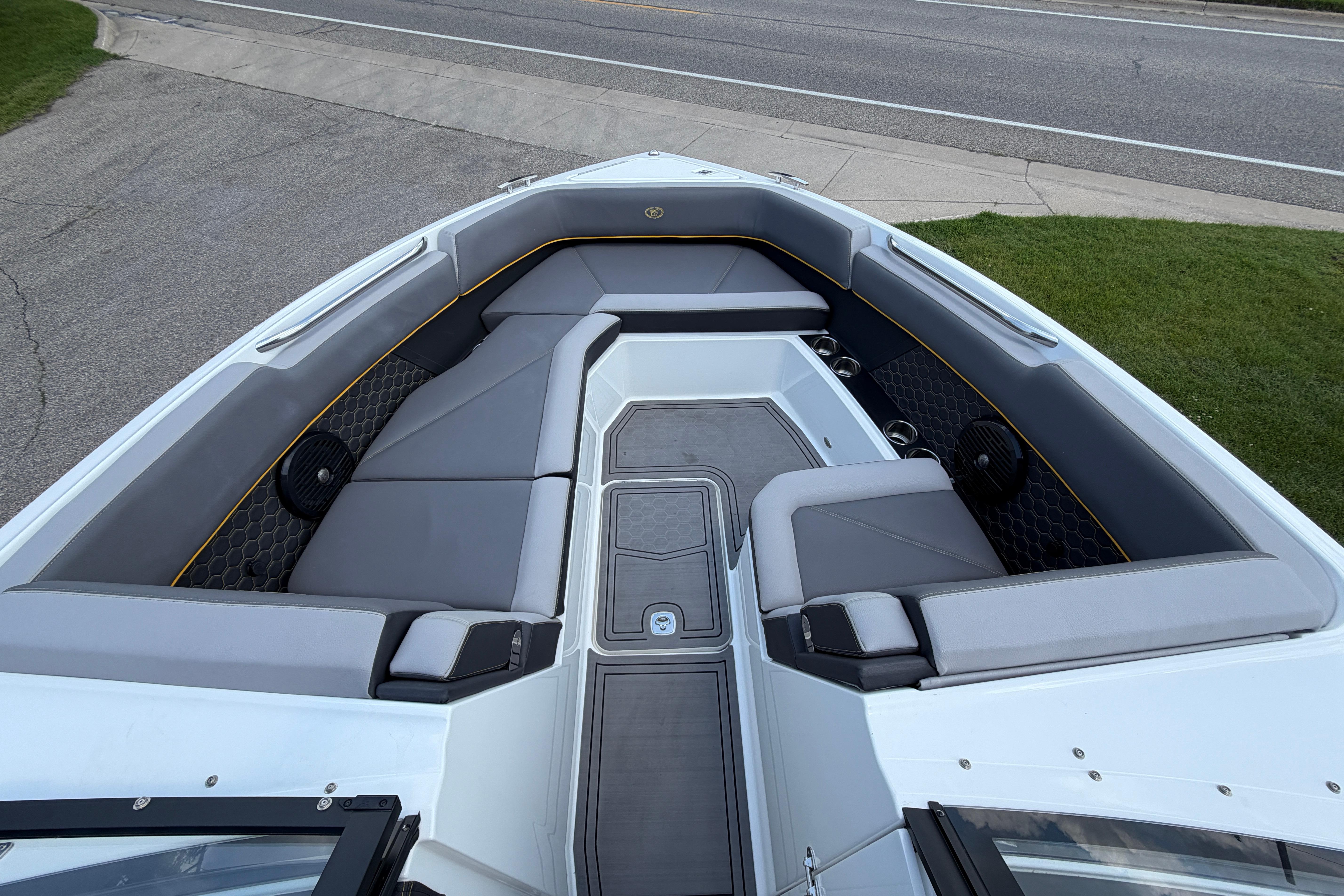 2021 Cobalt R8 Surf boat interior with sleek gray seating and modern design.
