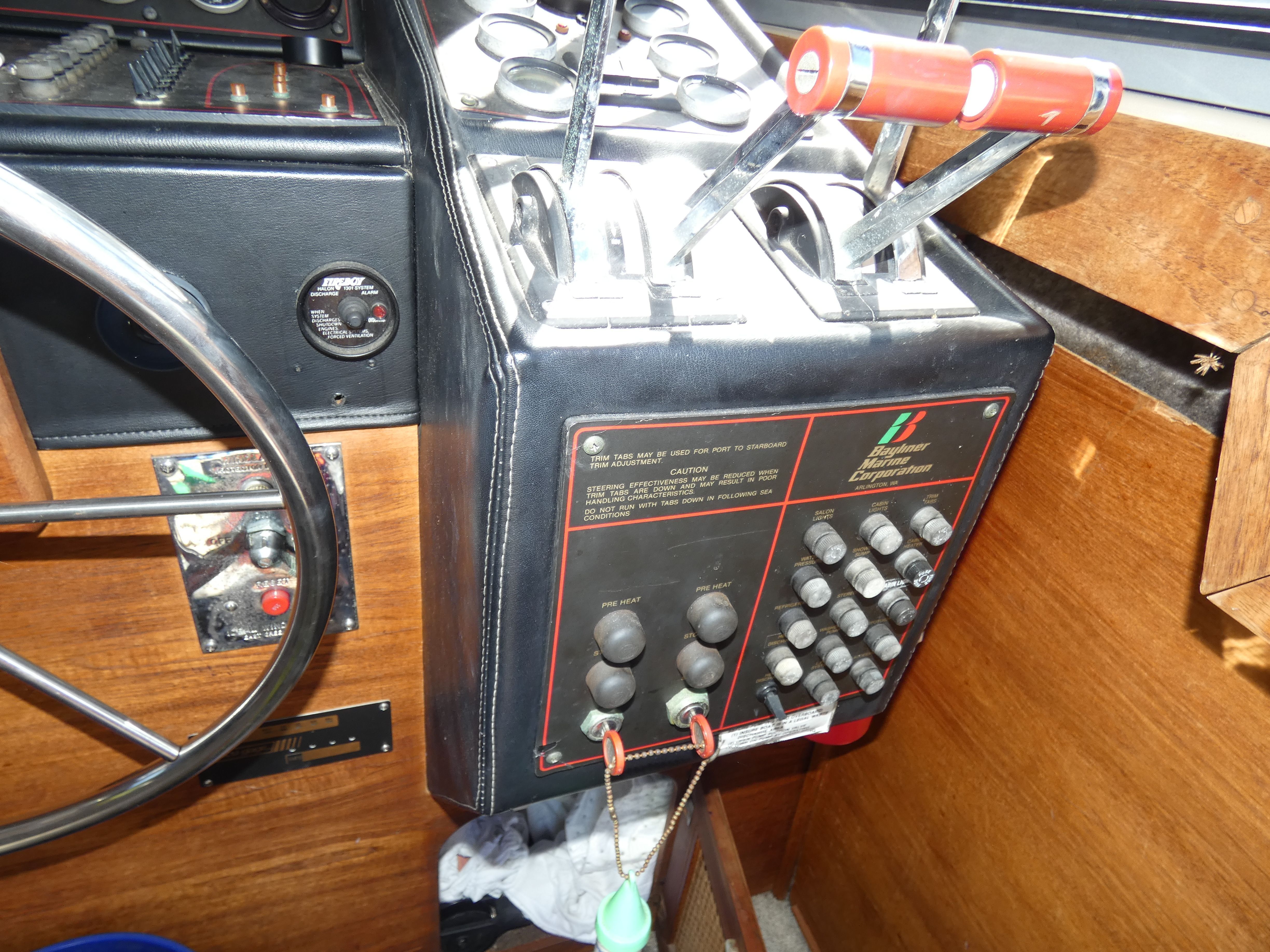 1984 Bayliner 3870 Motoryacht control panel with levers and switches.
