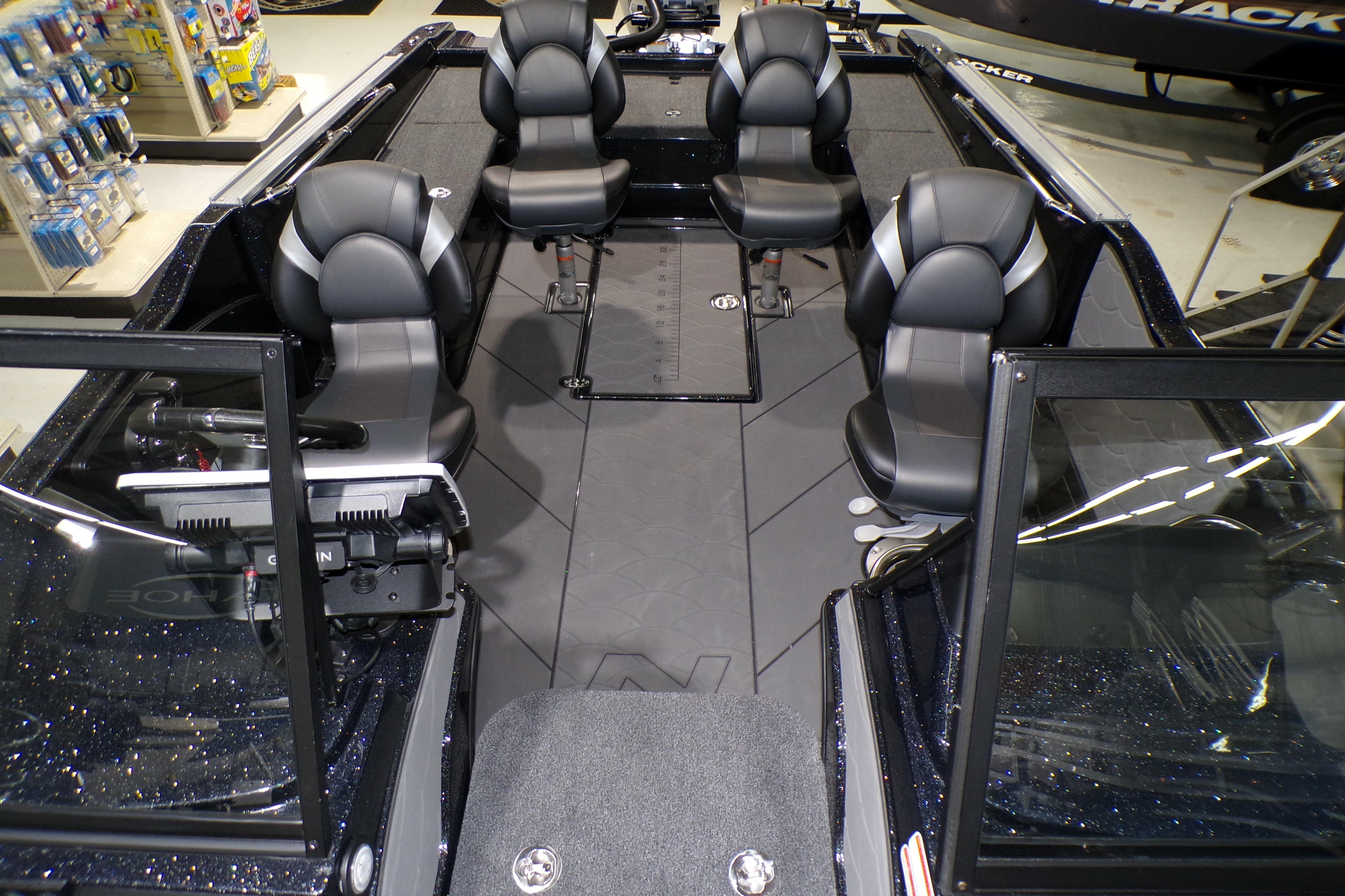 Interior of 2026 Nitro ZV21 Pro boat with four black seats and modern design.