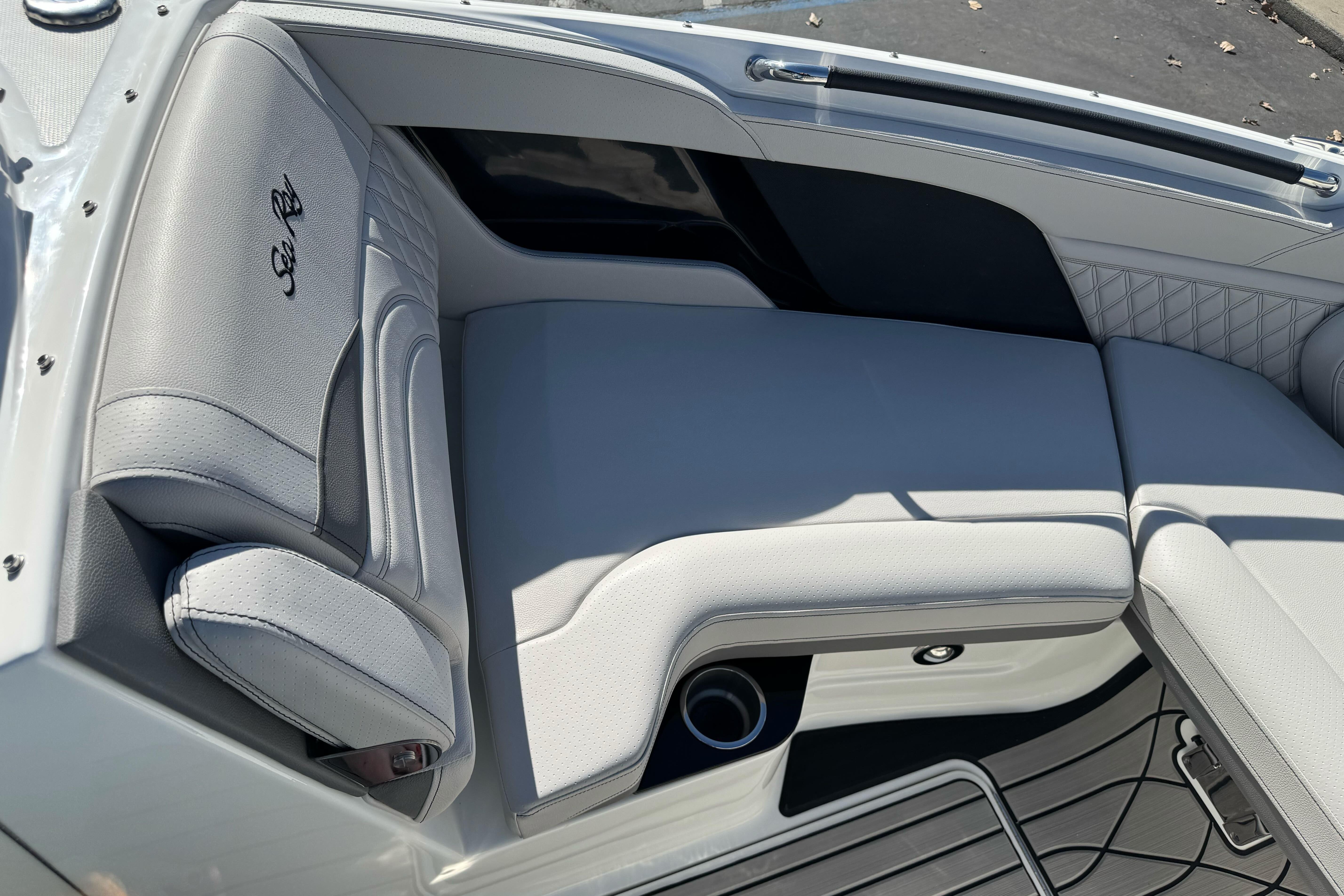 Luxurious seating on 2026 Sea Ray SLX 260 boat, featuring elegant design and premium materials.