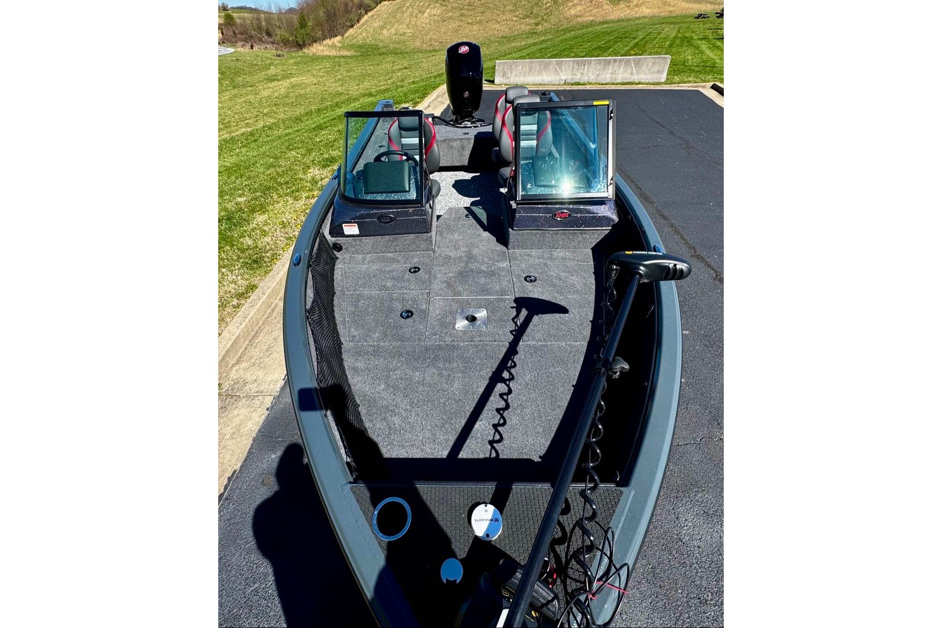2026 Ranger VS1882SC Reata boat with dual consoles and trolling motor on a sunny day.