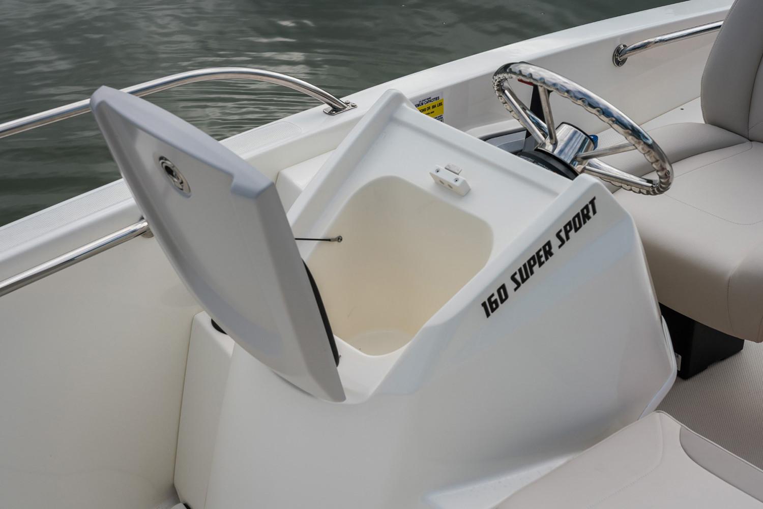 Manufacturer Provided Image: 2026 Boston Whaler 160 Super Sport boat interior with open storage compartment.