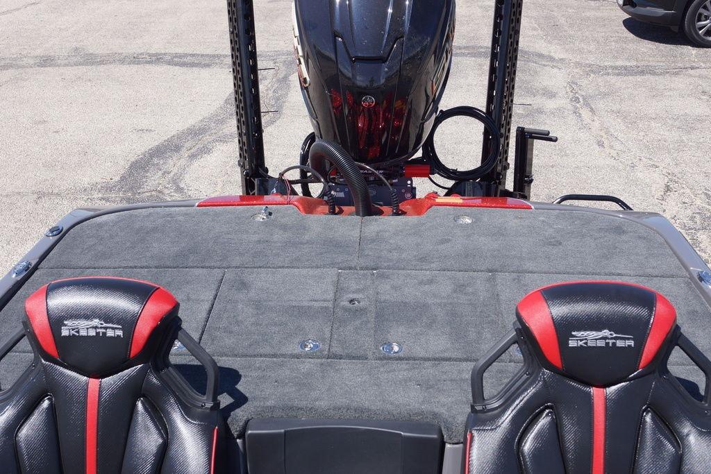 2026 Skeeter ZXE21 boat interior with dual seats and motor, showcasing sleek design.