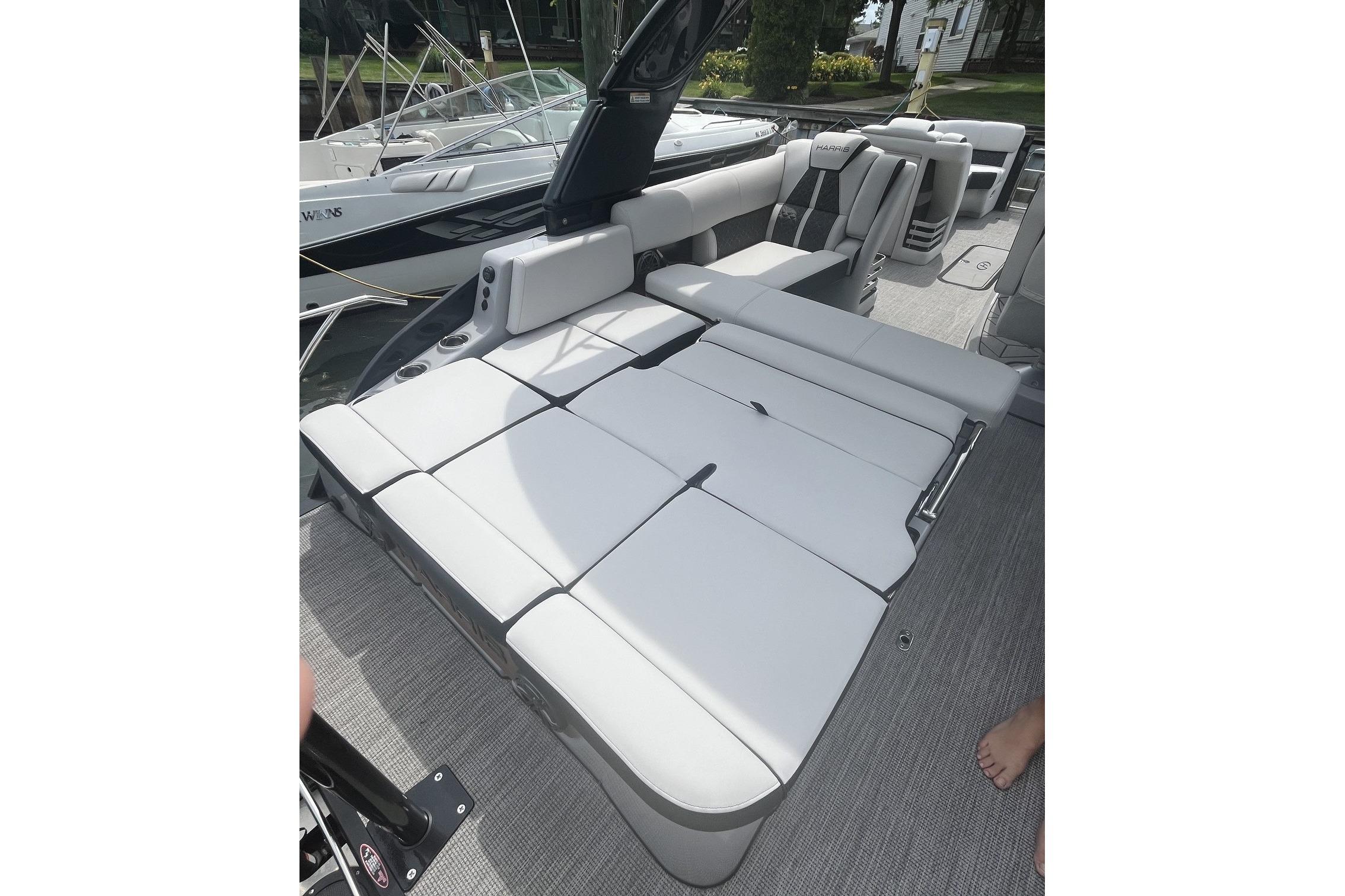 2024 Harris Grand Mariner 250 boat interior with luxurious seating and modern design.