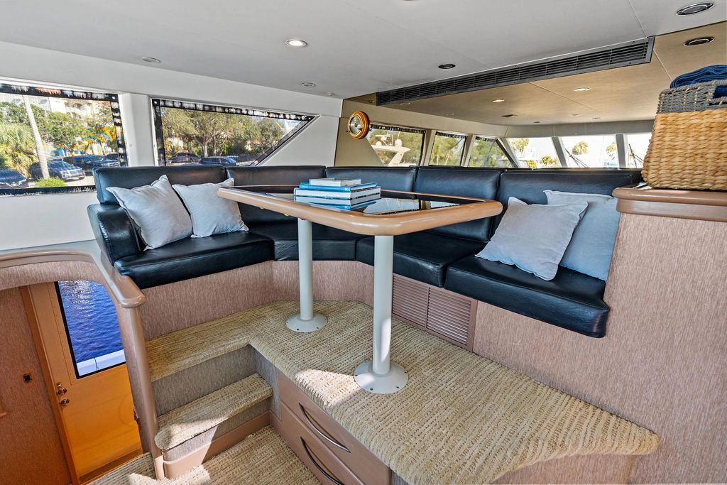 Interior of a 1999 Westport 112 yacht with cozy seating area.
