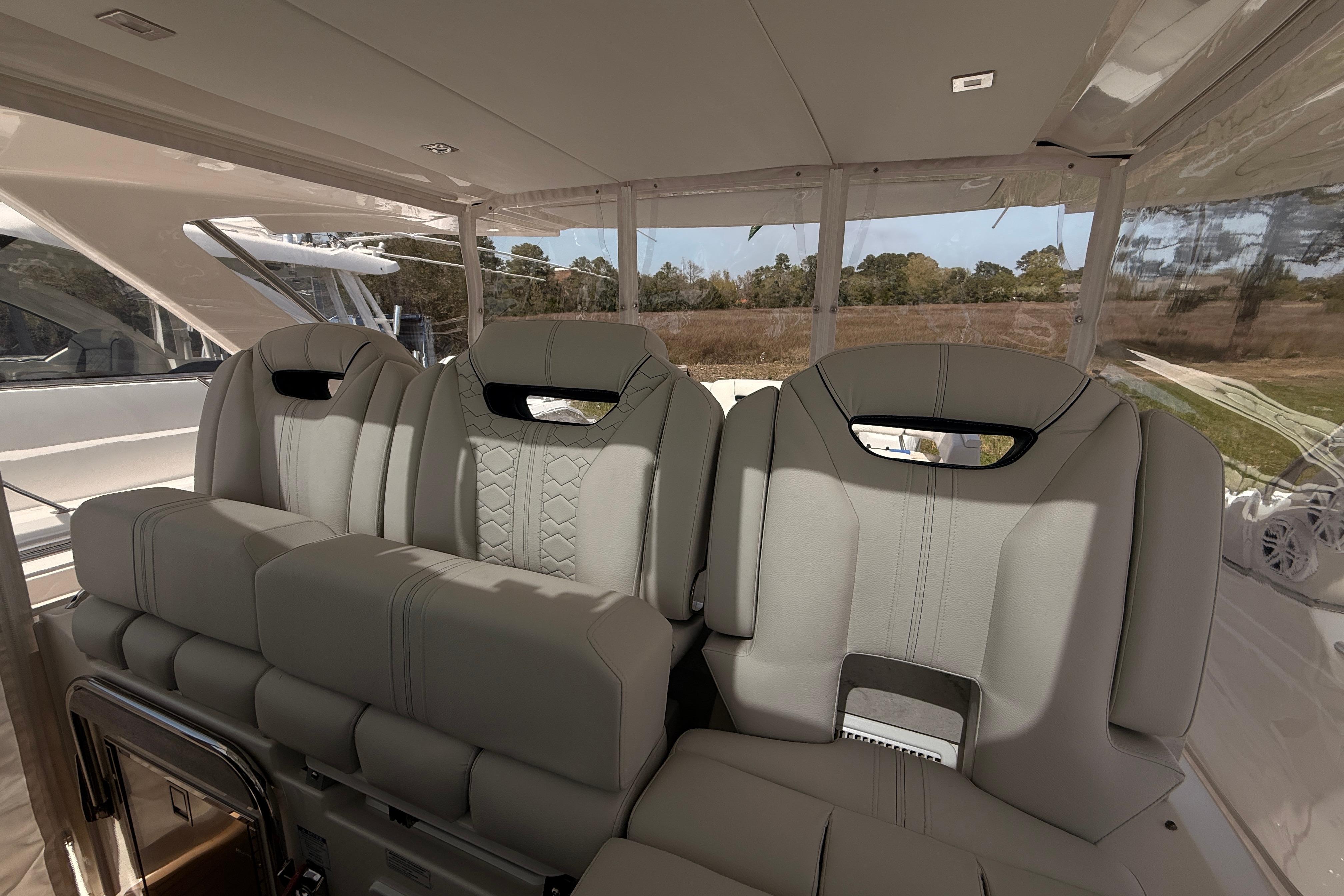 Luxurious seating on 2022 Tiara Yachts 38 LS, showcasing elegant design and comfort.