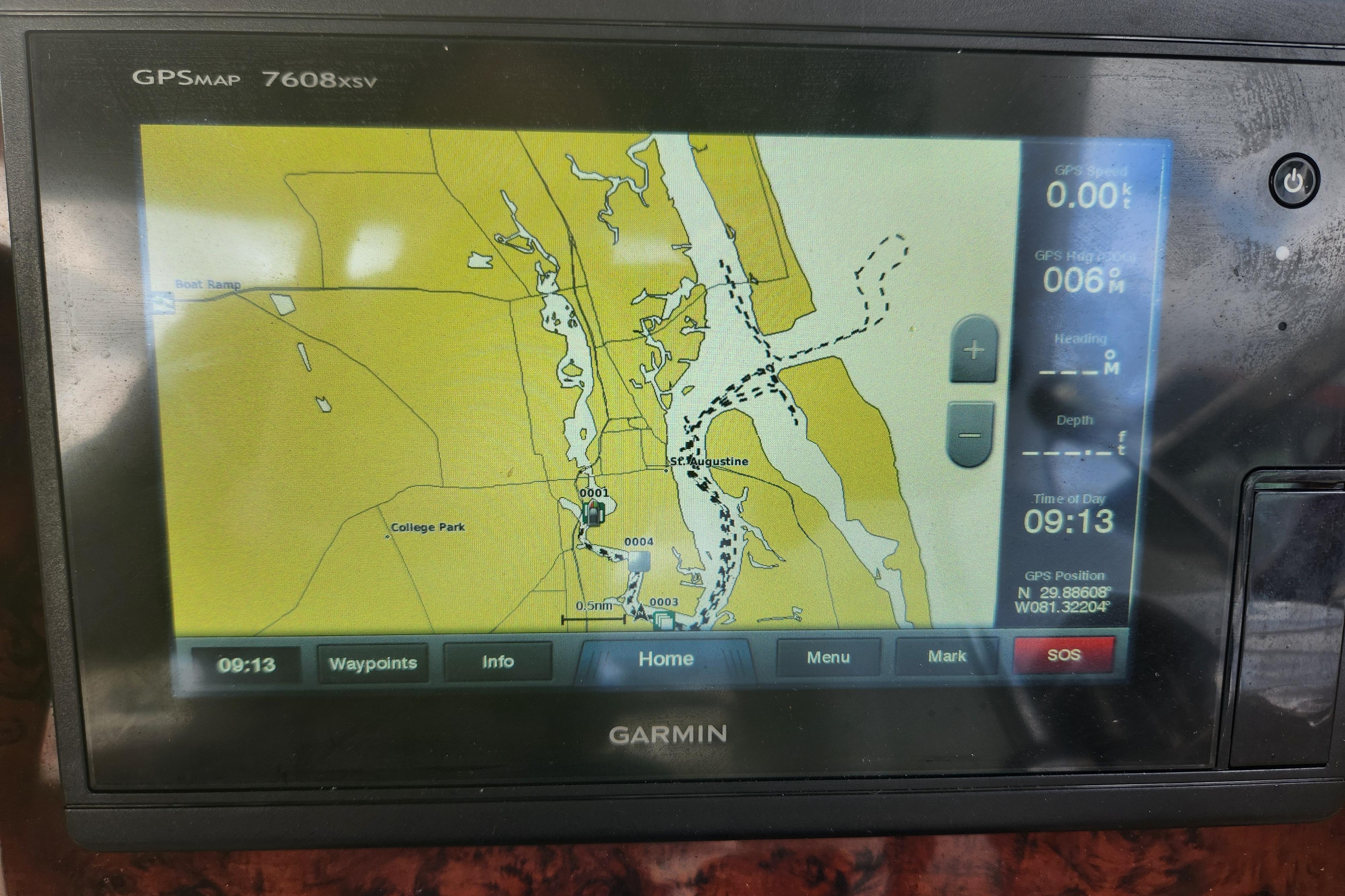 Garmin GPS display on 2003 Sea Ray 360 Sundancer, showing navigation map and coordinates.
