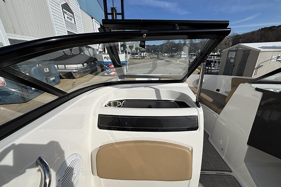 2023 Bayliner VR5 Bowrider OB interior view with windshield and seating.