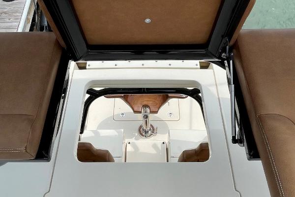 2020 Scout 420 LXF boat interior with brown seating and sleek design.