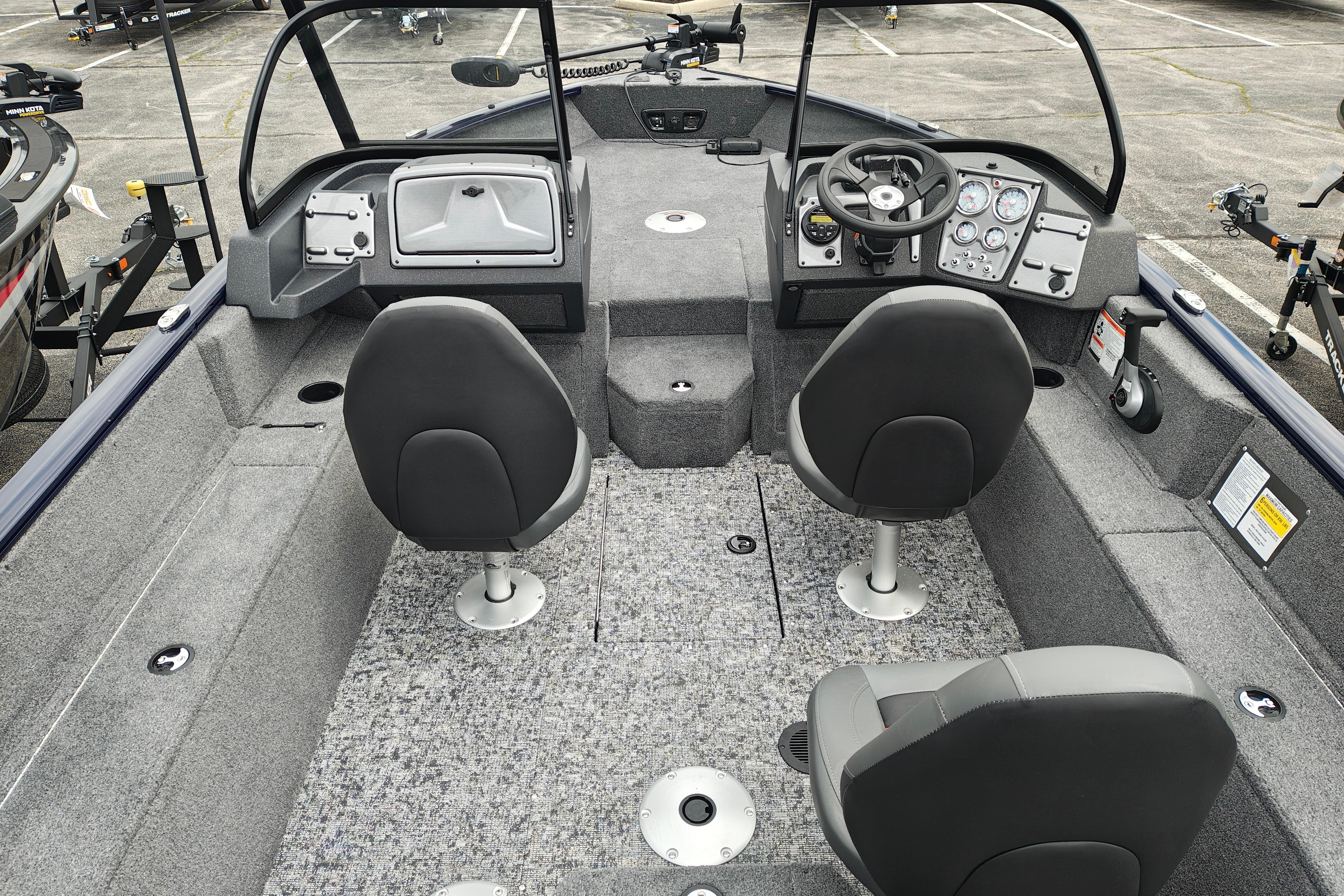 2026 Tracker Pro Guide V-175 WT boat interior with dual seats and modern dashboard.