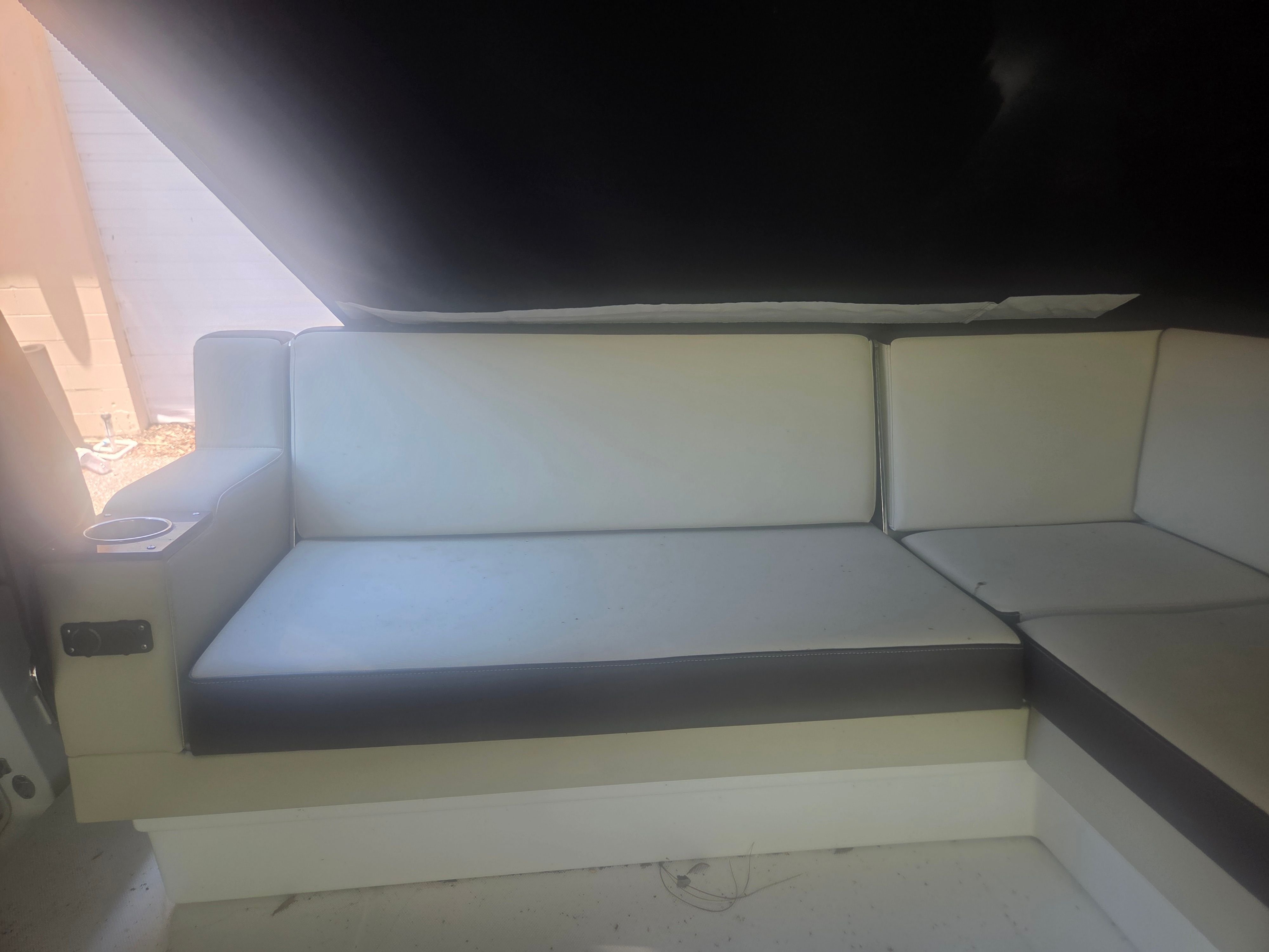 Interior of a 2019 Monterey 360SC with white upholstery.