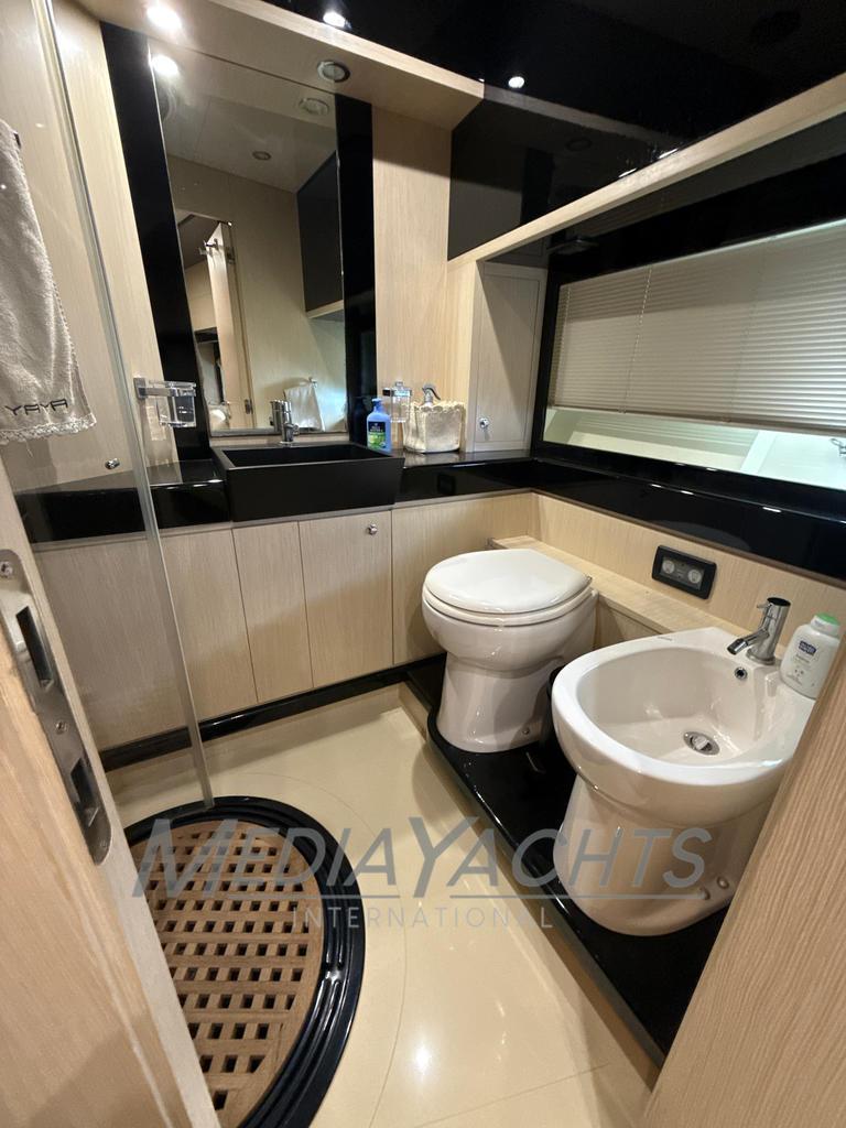 Luxurious bathroom in 2007 Riva Venere 75 yacht with modern fixtures and elegant design.