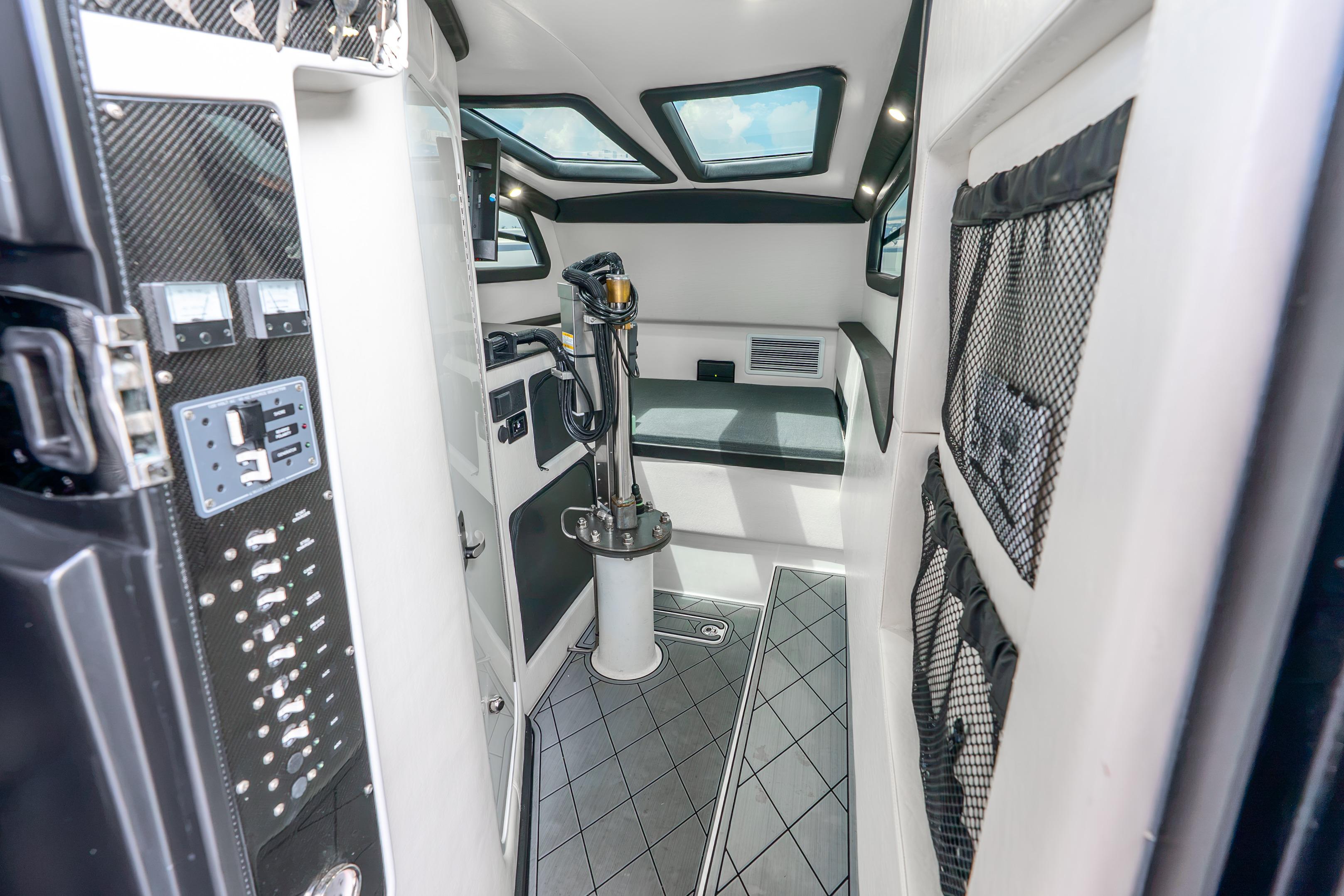 Interior of 2024 Nor-Tech 452 Super Fish boat, featuring modern controls and sleek design.