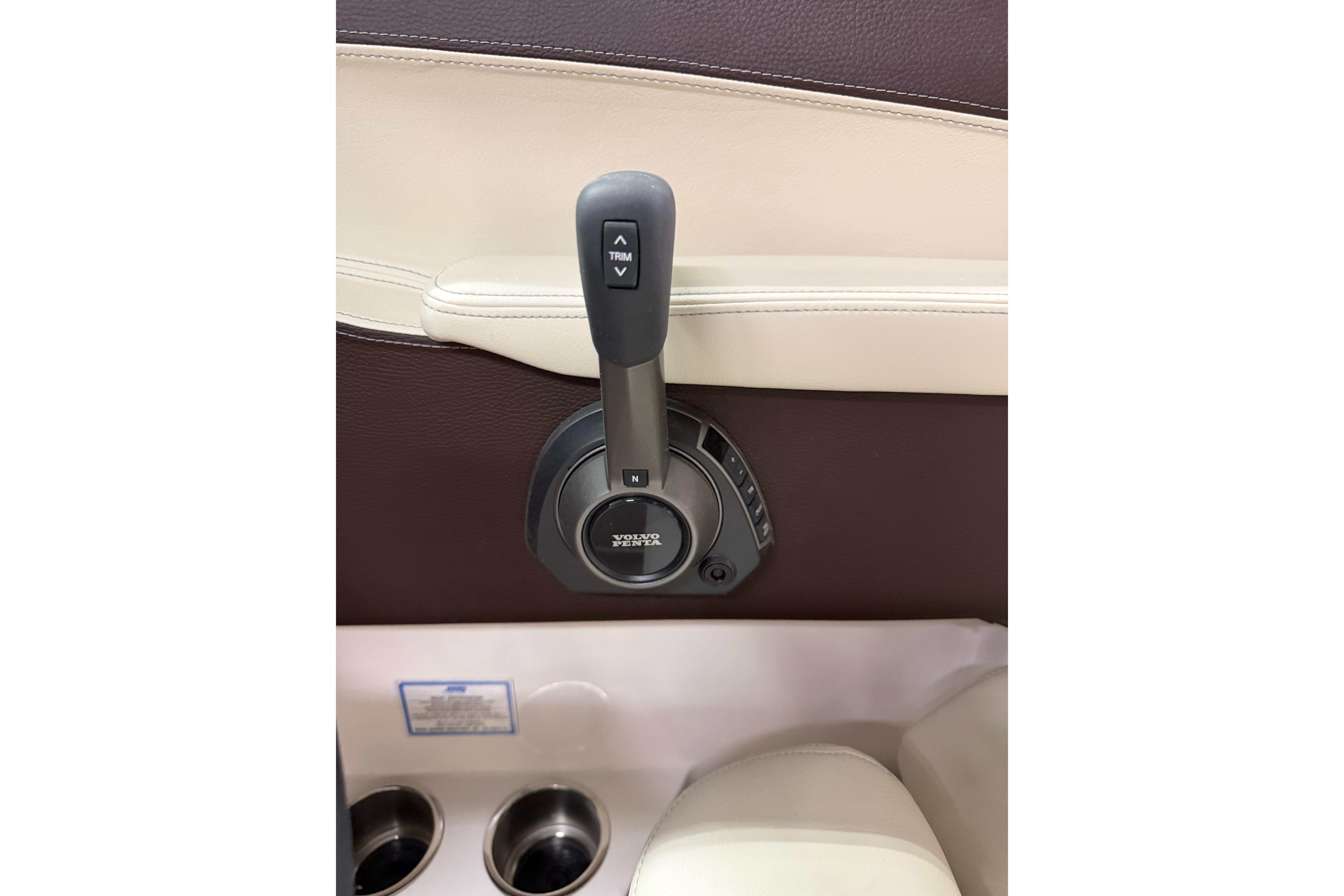 2026 Regal LS6 boat throttle control with trim adjustment lever.