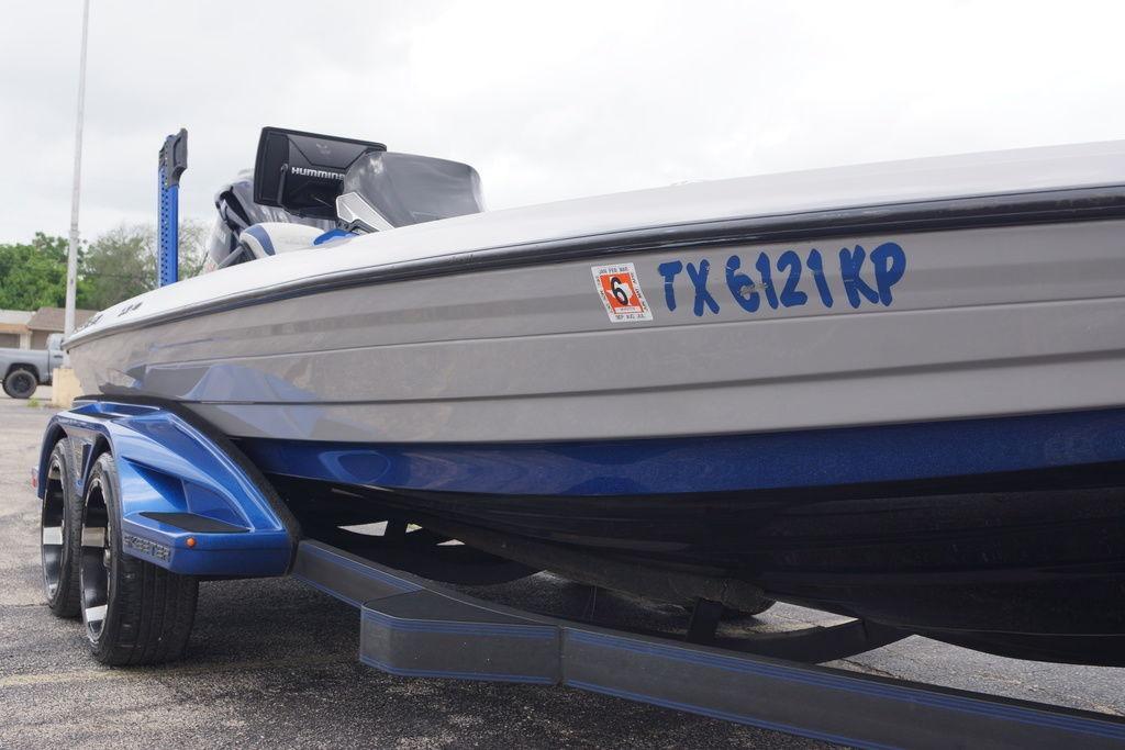 2020 Skeeter FXR21 Limited boat on trailer, displaying registration TX 6121 KP.