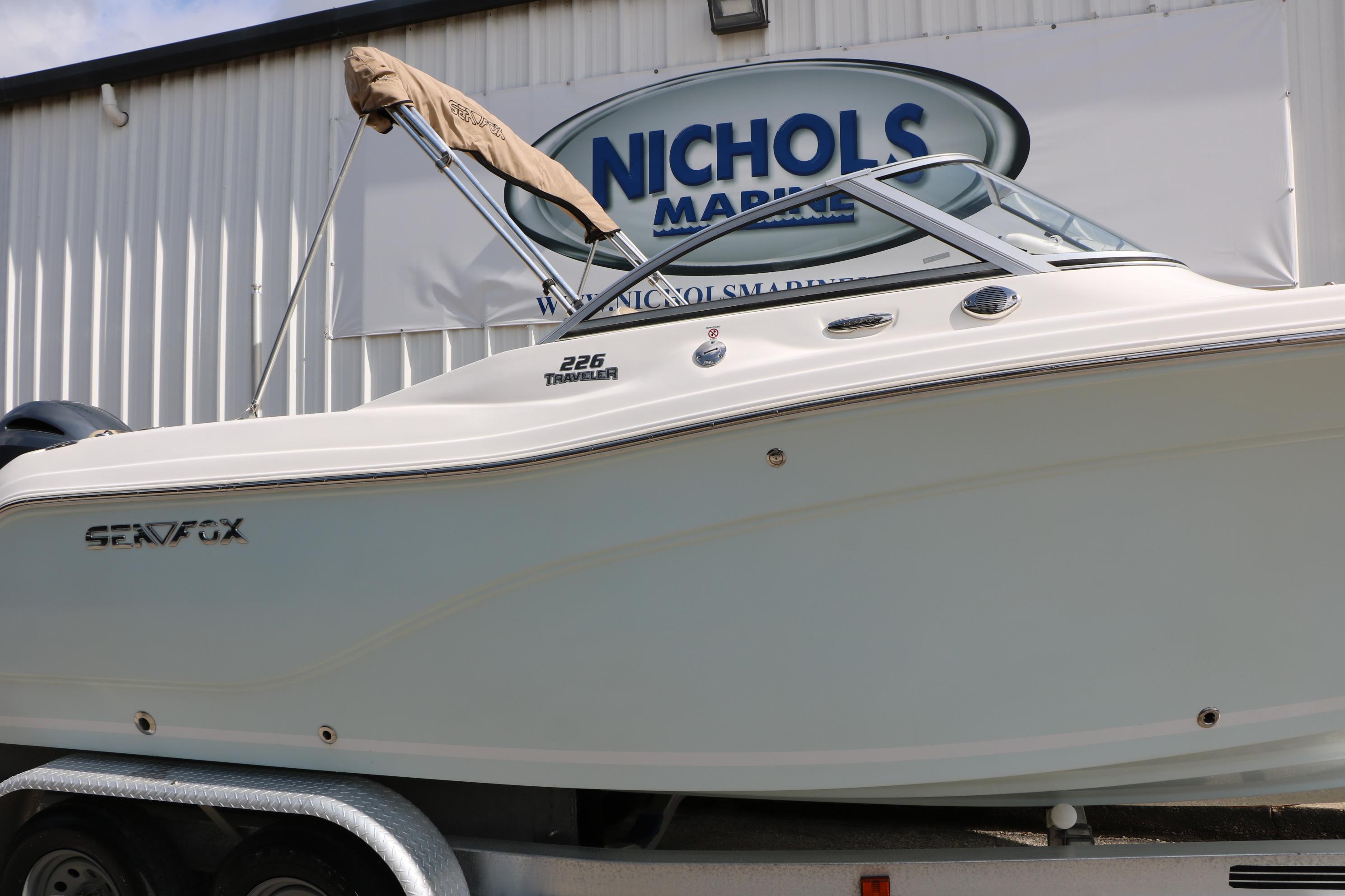 2017 Sea Fox 226 Traveler boat displayed at Nichols Marine dealership.
