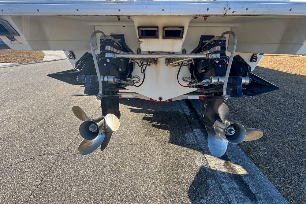 1989 Formula 292 SR-1 boat stern with dual propellers and outboard motors.