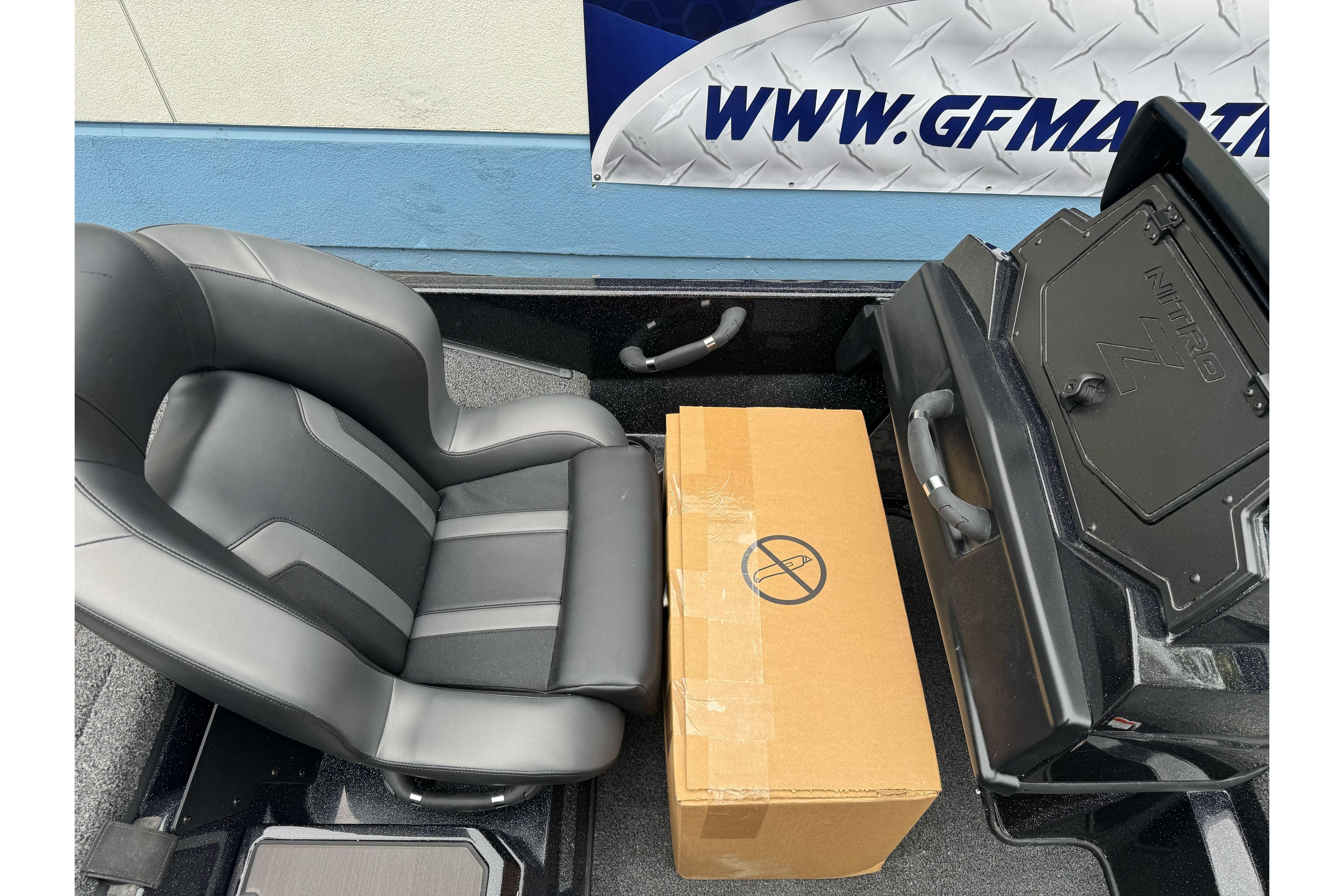 2026 Nitro Z20 XL Pro boat seat with a cardboard box on deck.