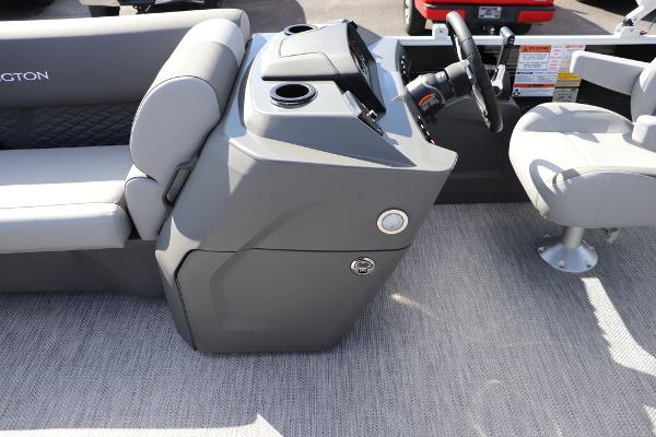 2024 Bennington 20 SL boat interior with gray seating and steering console.