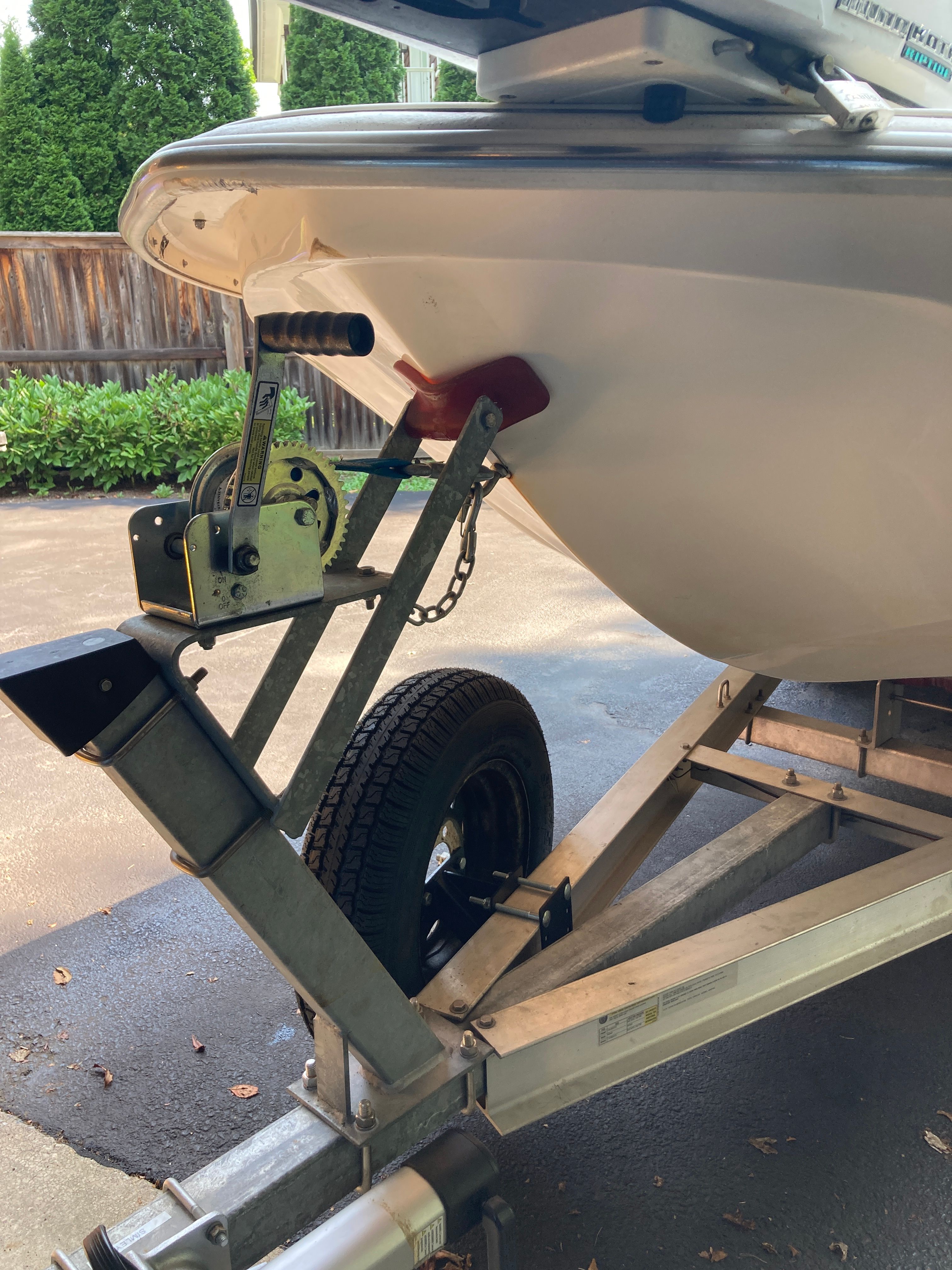 A 2012 Carolina Skiff JVX16CC on a trailer, ready for transport.