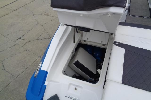 2019 Monterey 218SS Super Sport boat storage compartment with open lid.