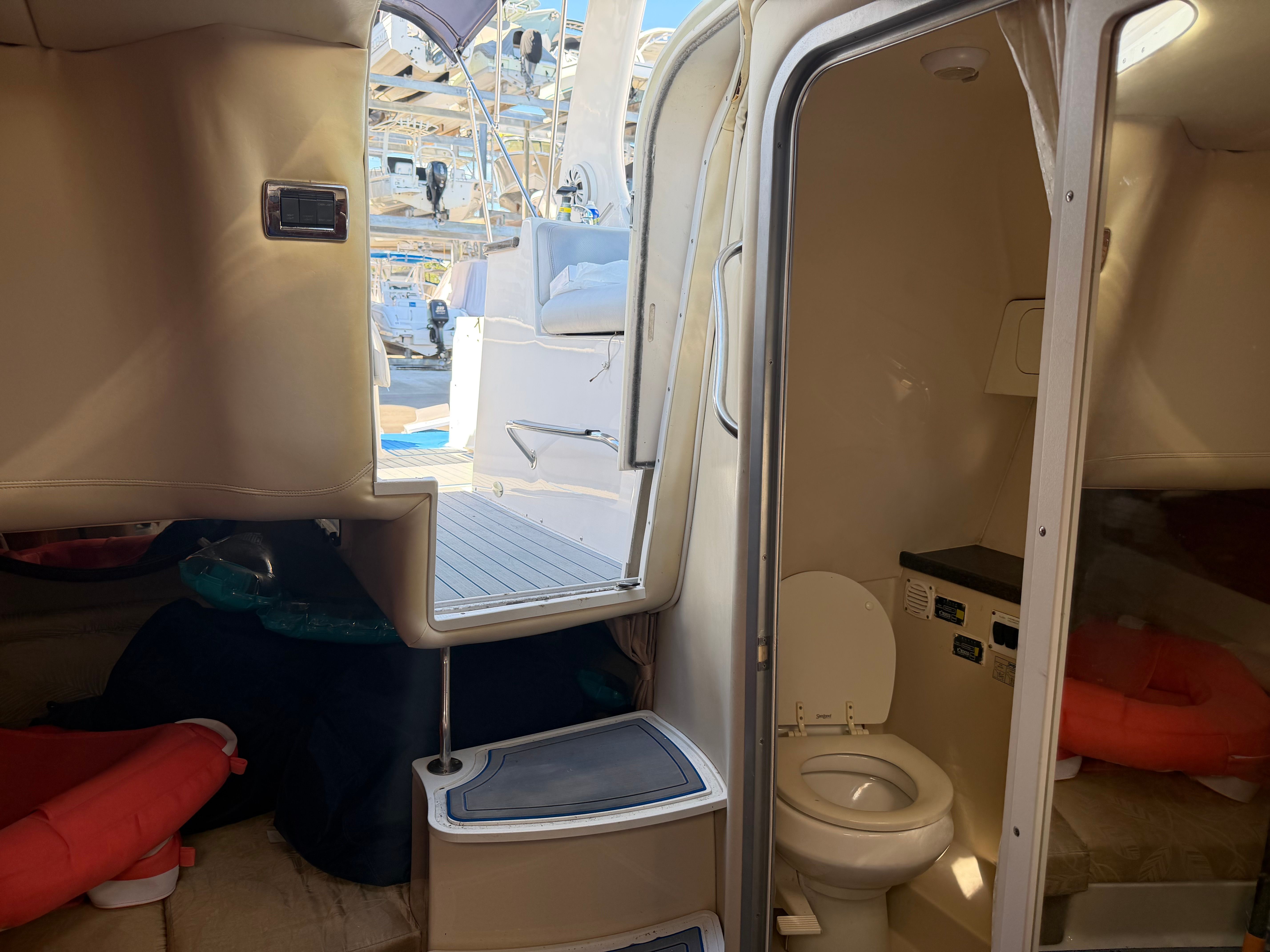 Interior of a 2006 Four Winns 328 Vista yacht with toilet.