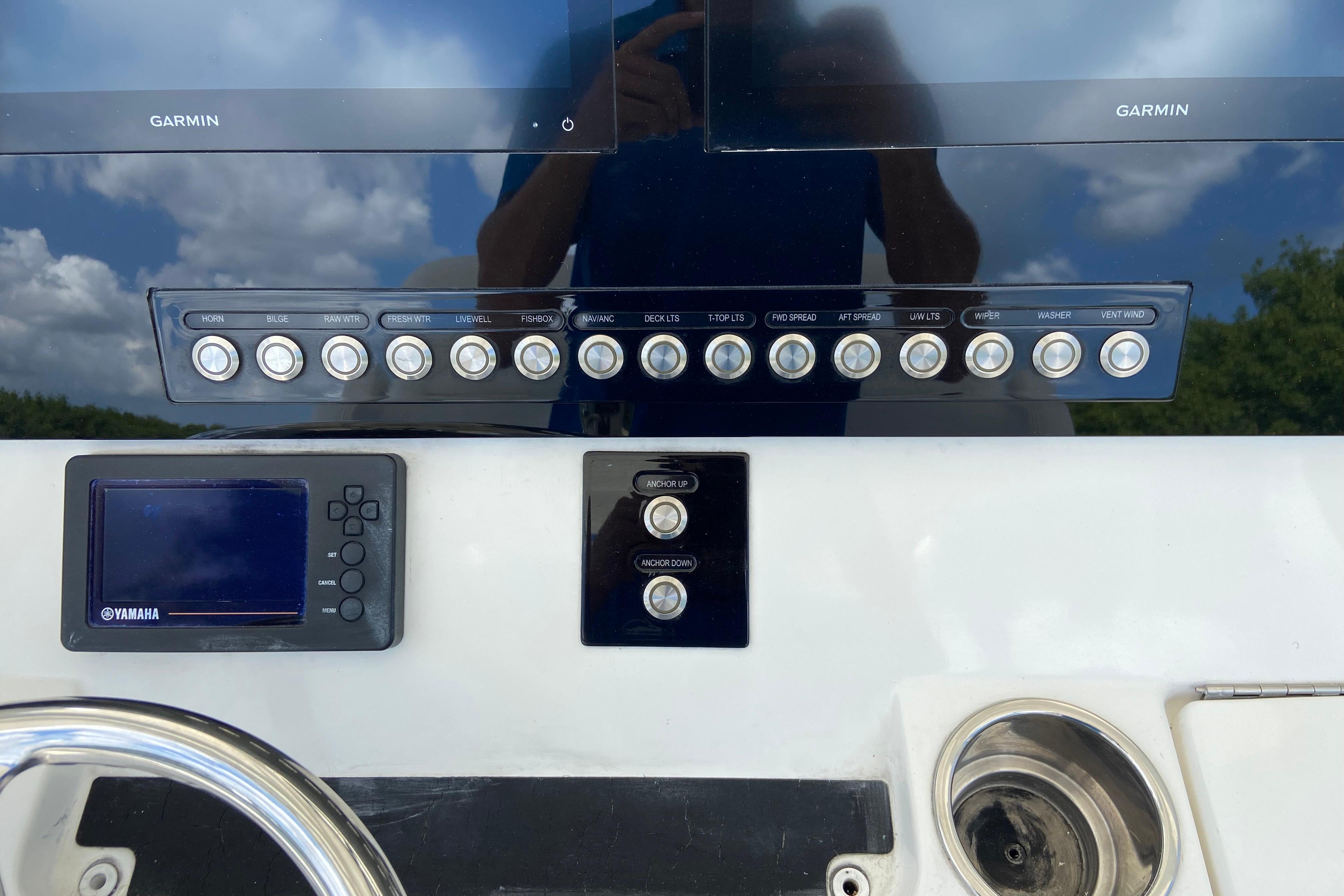 Control panel of a 2021 Regulator 28 boat with Garmin and Yamaha displays.