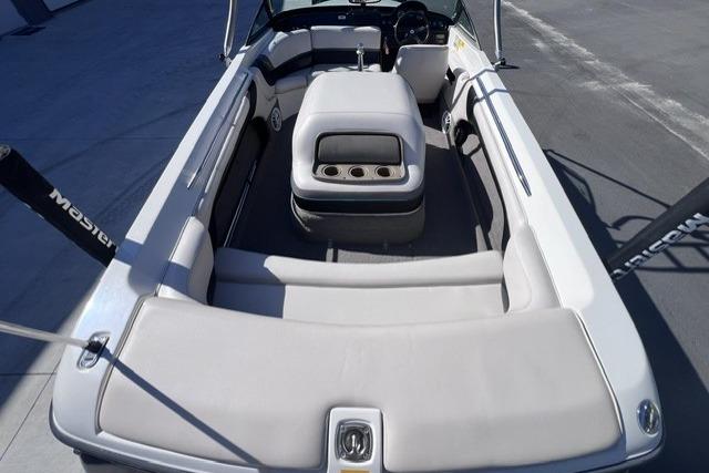 1996 MasterCraft ProStar 190 boat interior with seating and steering wheel.