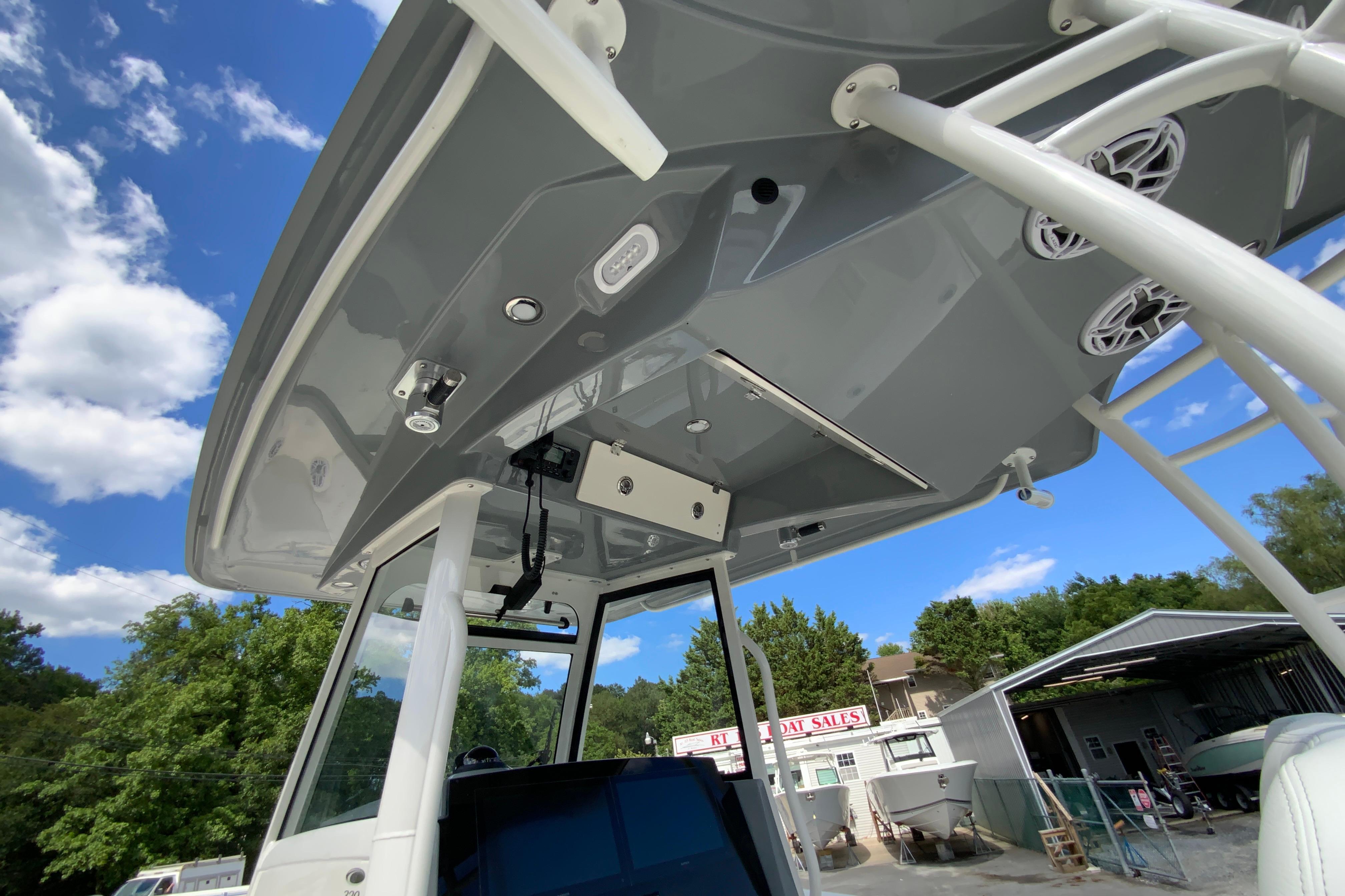 2027 Cobia 320 Center Console boat with sleek design and modern features.
