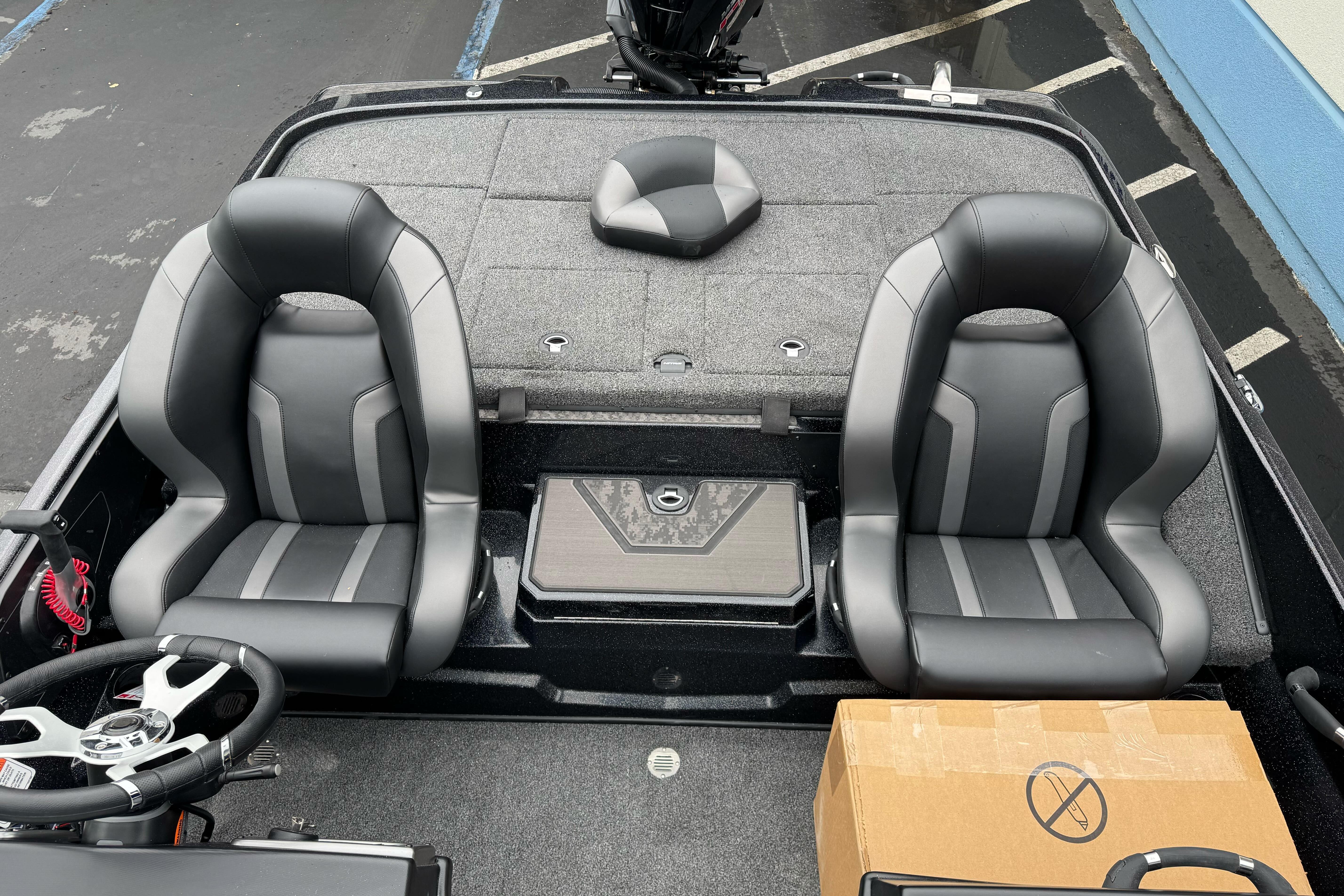 2026 Nitro Z20 XL Pro boat interior with dual seats and steering wheel.
