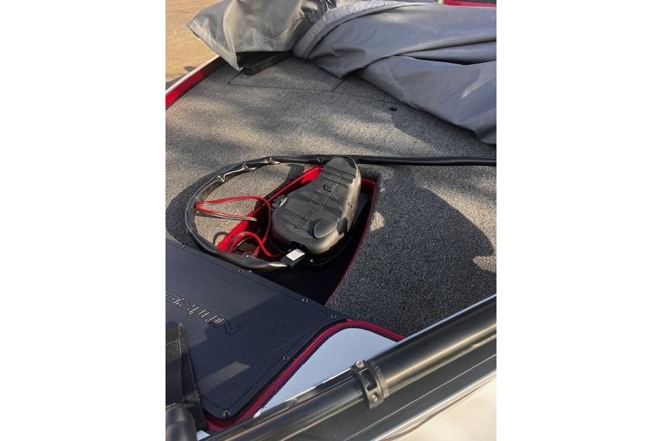 2026 Nitro Z17 boat interior with carpeted deck and storage compartment.