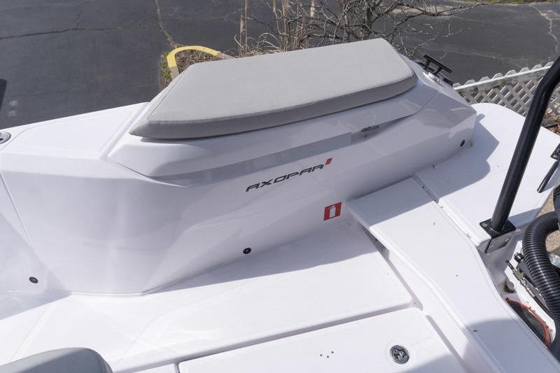 2025 Axopar 29 XC Cross Cabin boat deck with seating and branding.