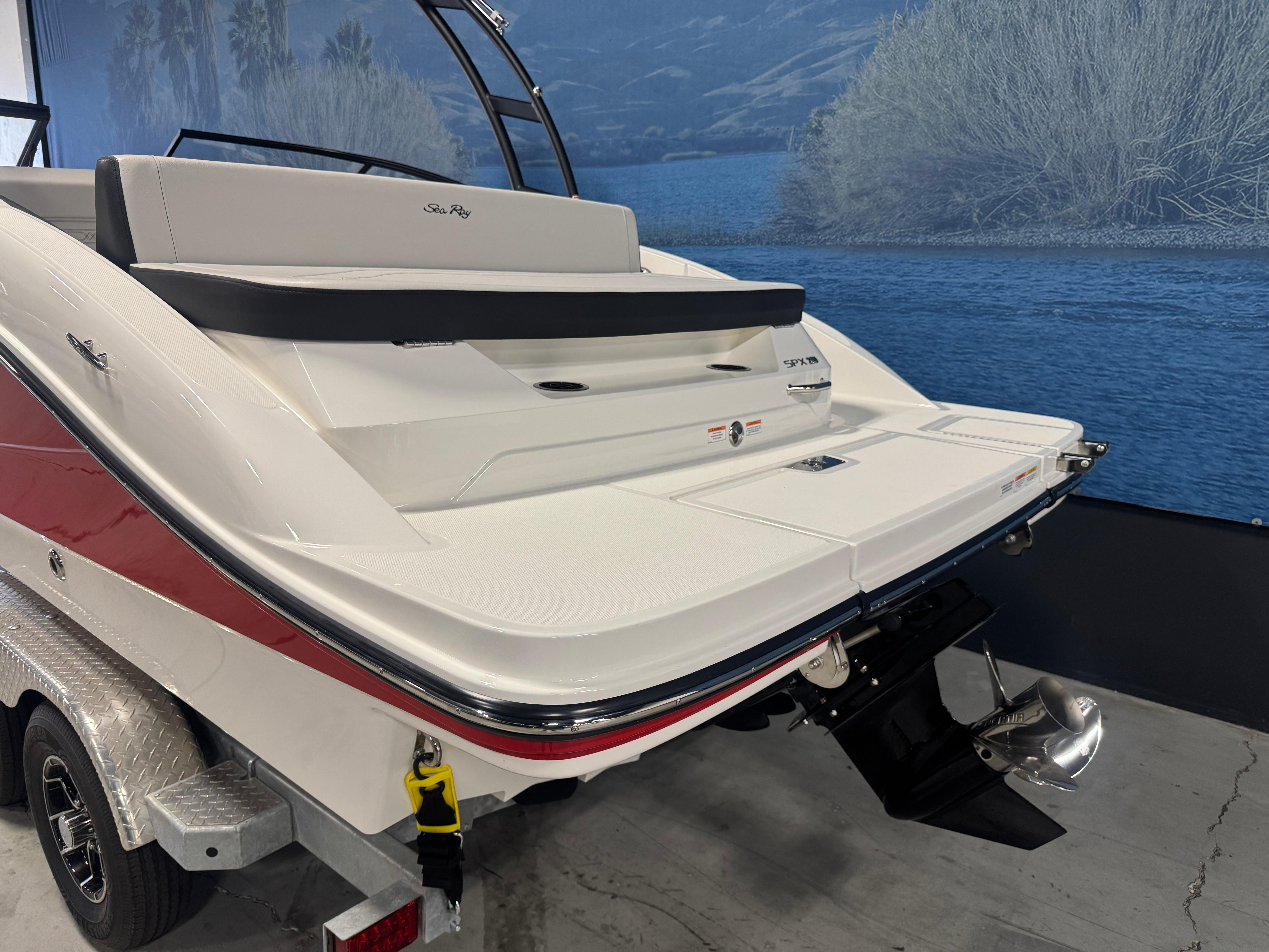 2026 Sea Ray SPX 210 boat rear view, showcasing sleek design and modern features.
