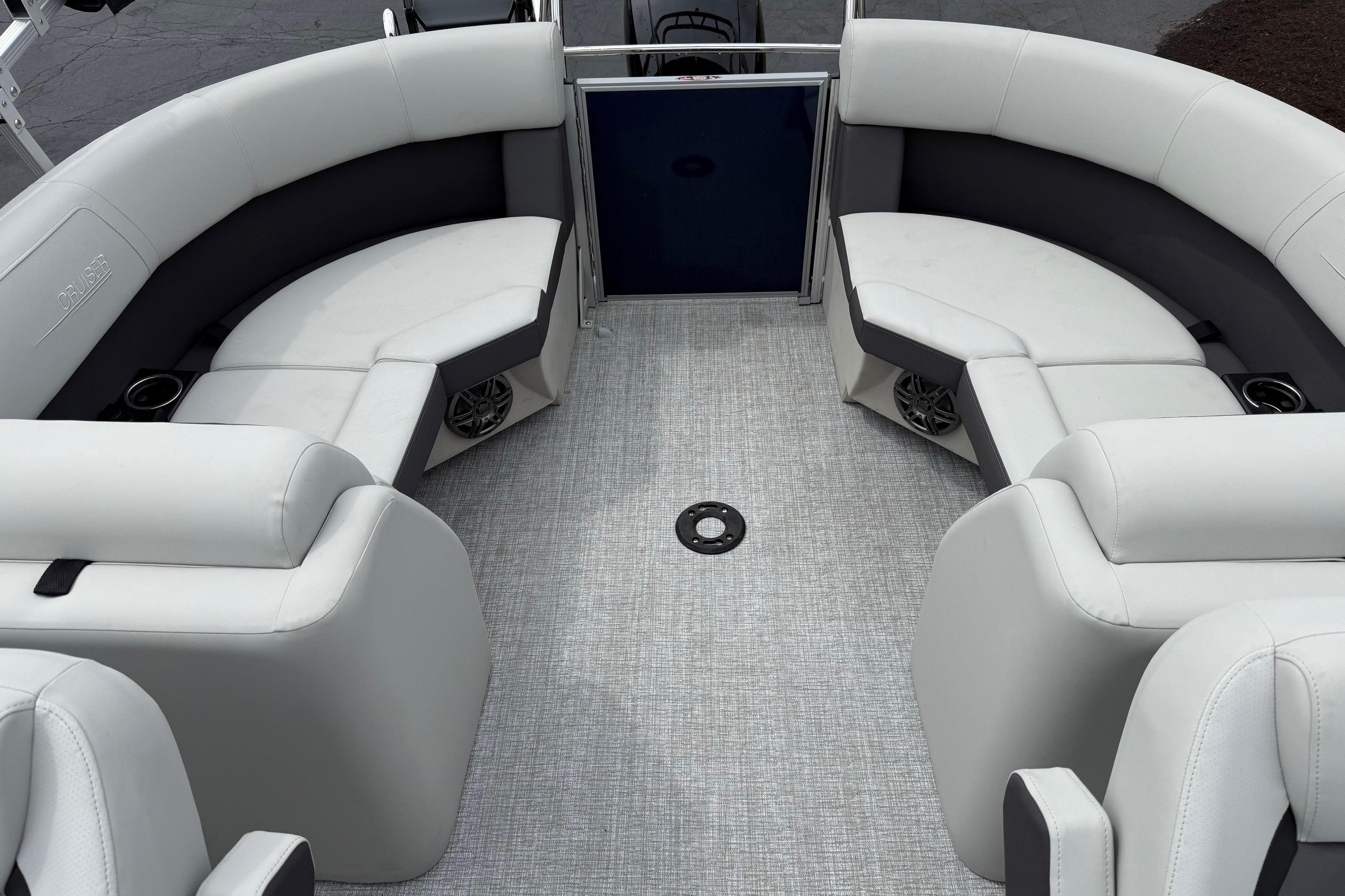 2025 Harris Cruiser 230 boat interior with plush seating and modern design.