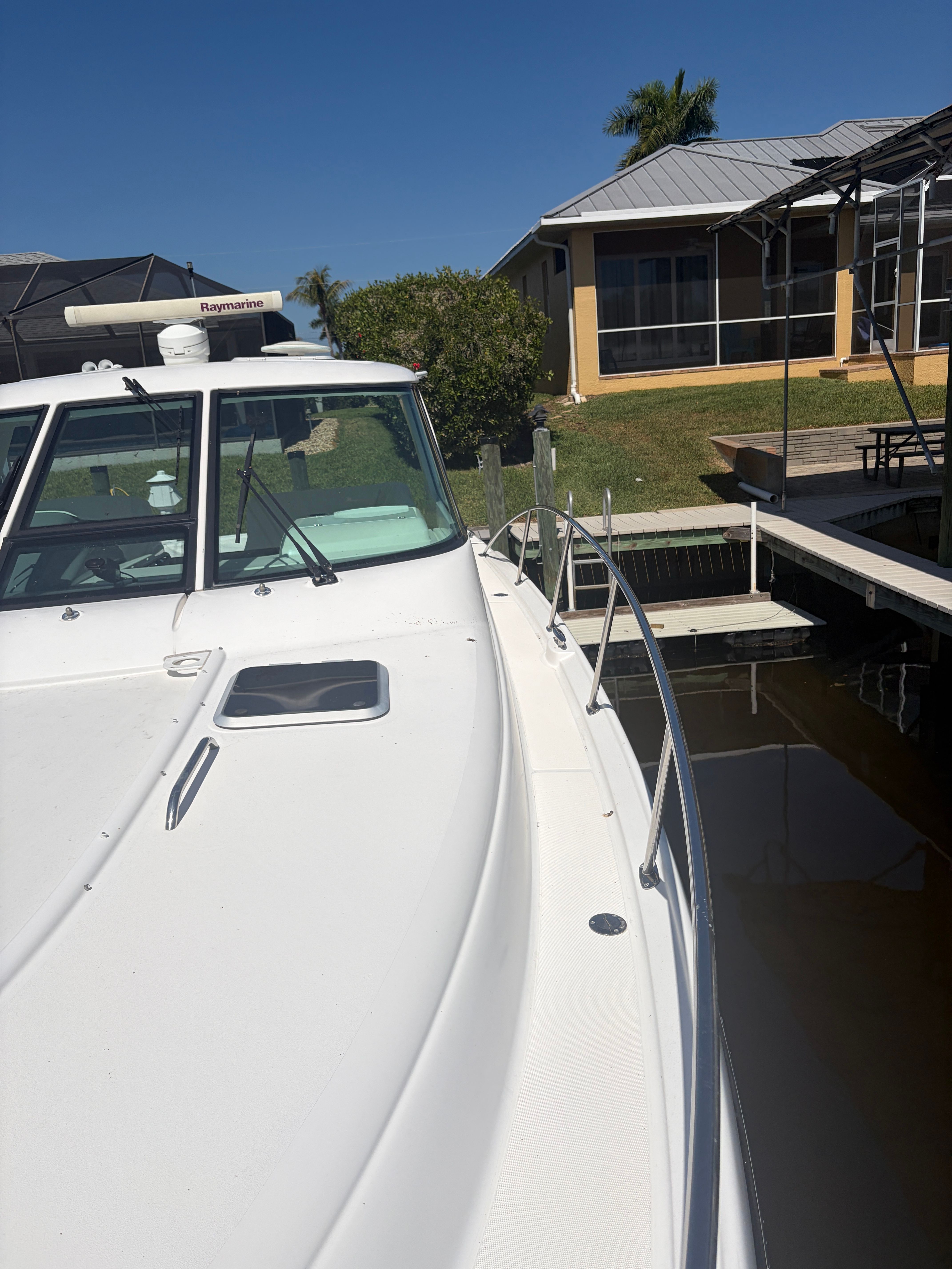 2005 Tiara Yachts Sovran docked under sunny skies.
