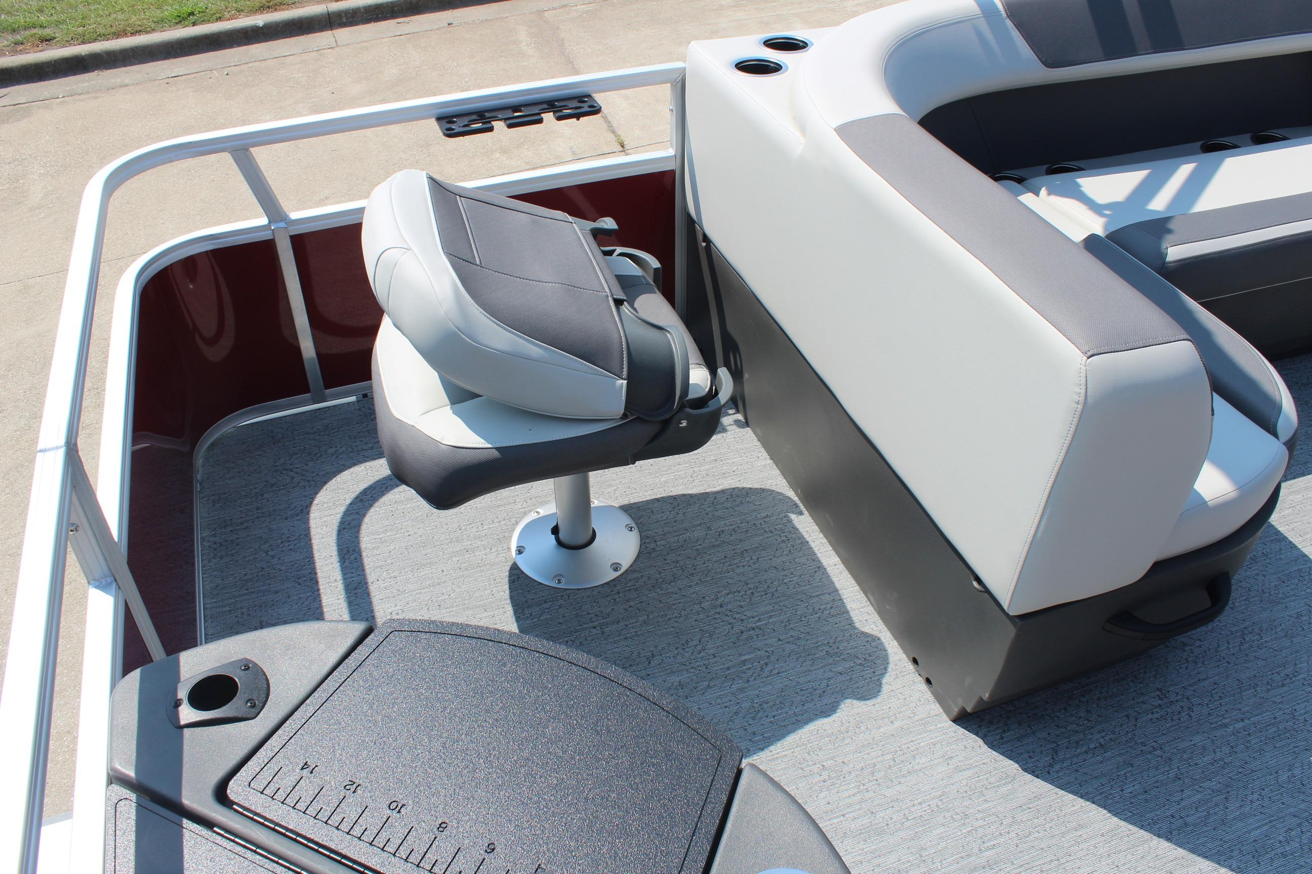 2026 Sun Tracker Bass Buggy 18 DLX interior with seating and fishing station.