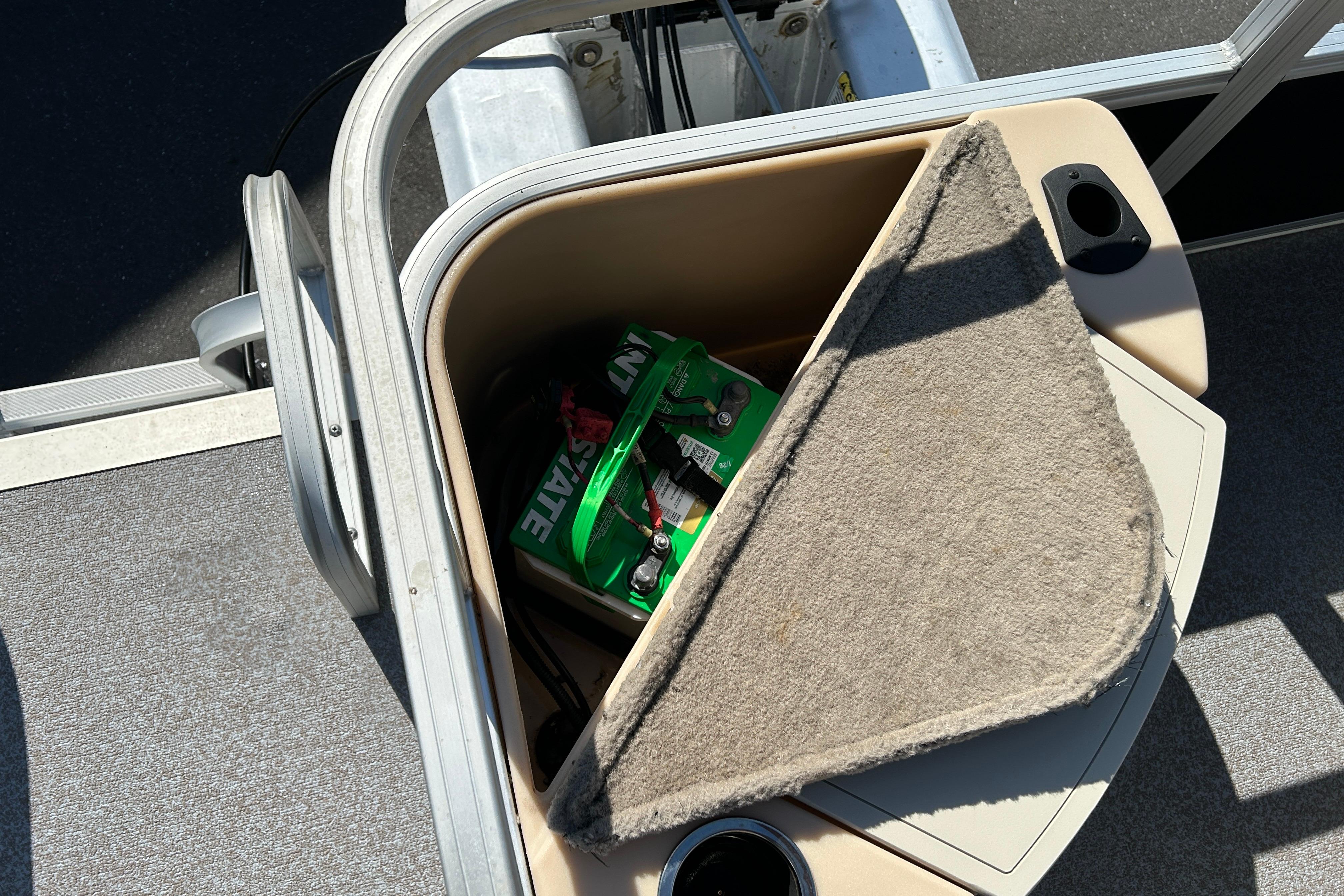 Storage compartment on a 2017 Sun Tracker Bass Buggy 18 DLX pontoon boat.